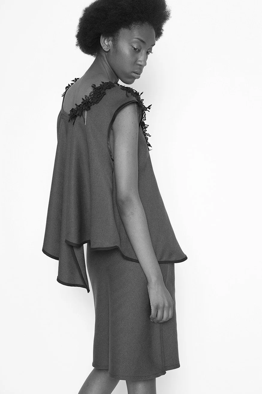 Zara Saberi — Contemporary textile artwork where embroidery becomes part of the garment's structure.