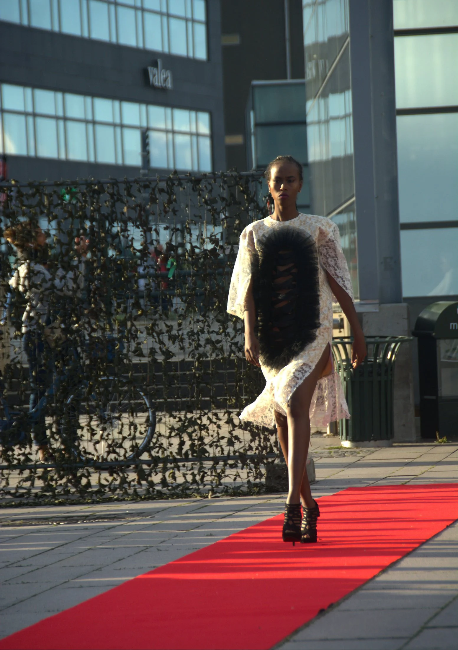 Zara Saberi — Artistic runway garment from the I Don't Care collection featuring sculptural lace details.