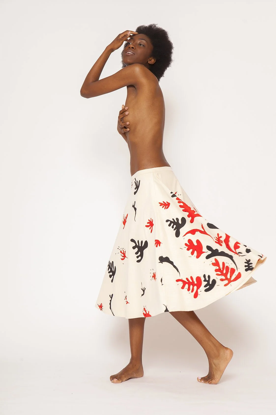 Zara Saberi — Wearable art piece balancing painting, embroidery and textile construction.