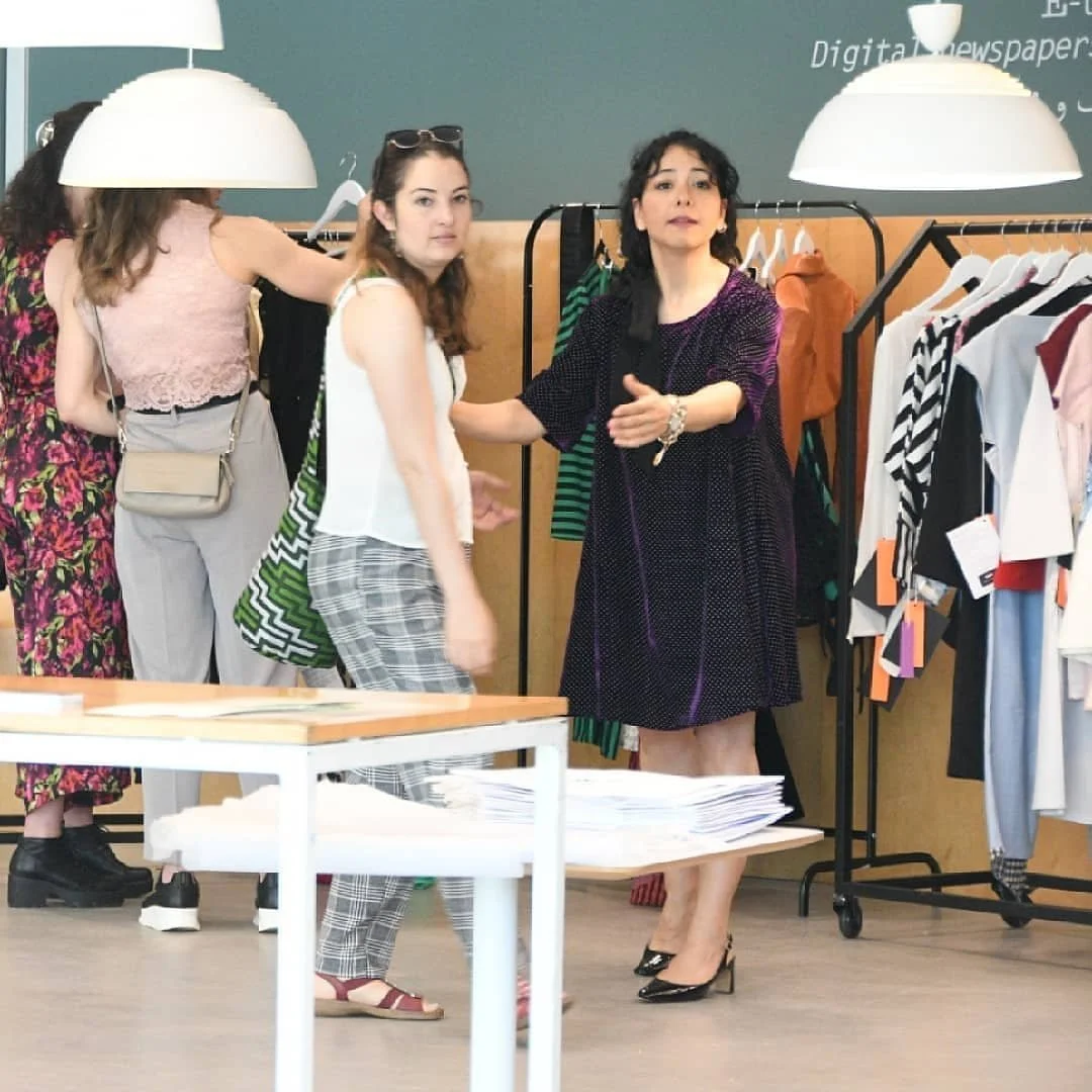 Zara Saberi at international fashion showrooms.