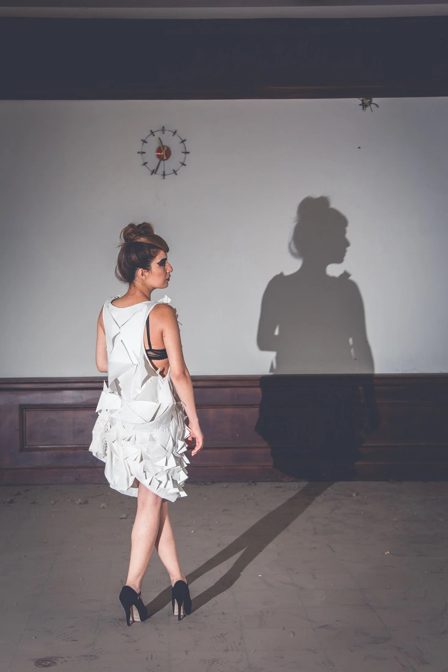 Zara Saberi — A look from the Triangles project, exploring geometry, balance and handcrafted textile construction.