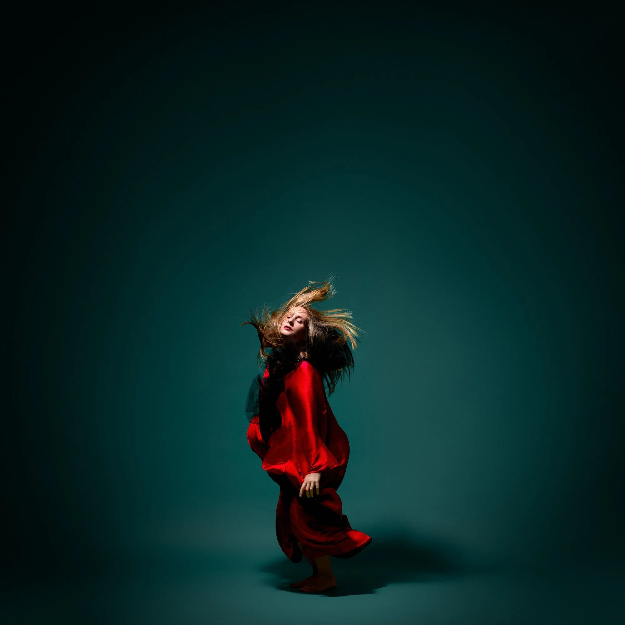 Zara Saberi — Wearable fashion artwork featuring a red tulle and viscose kaftan, photographed in Madrid, Spain.