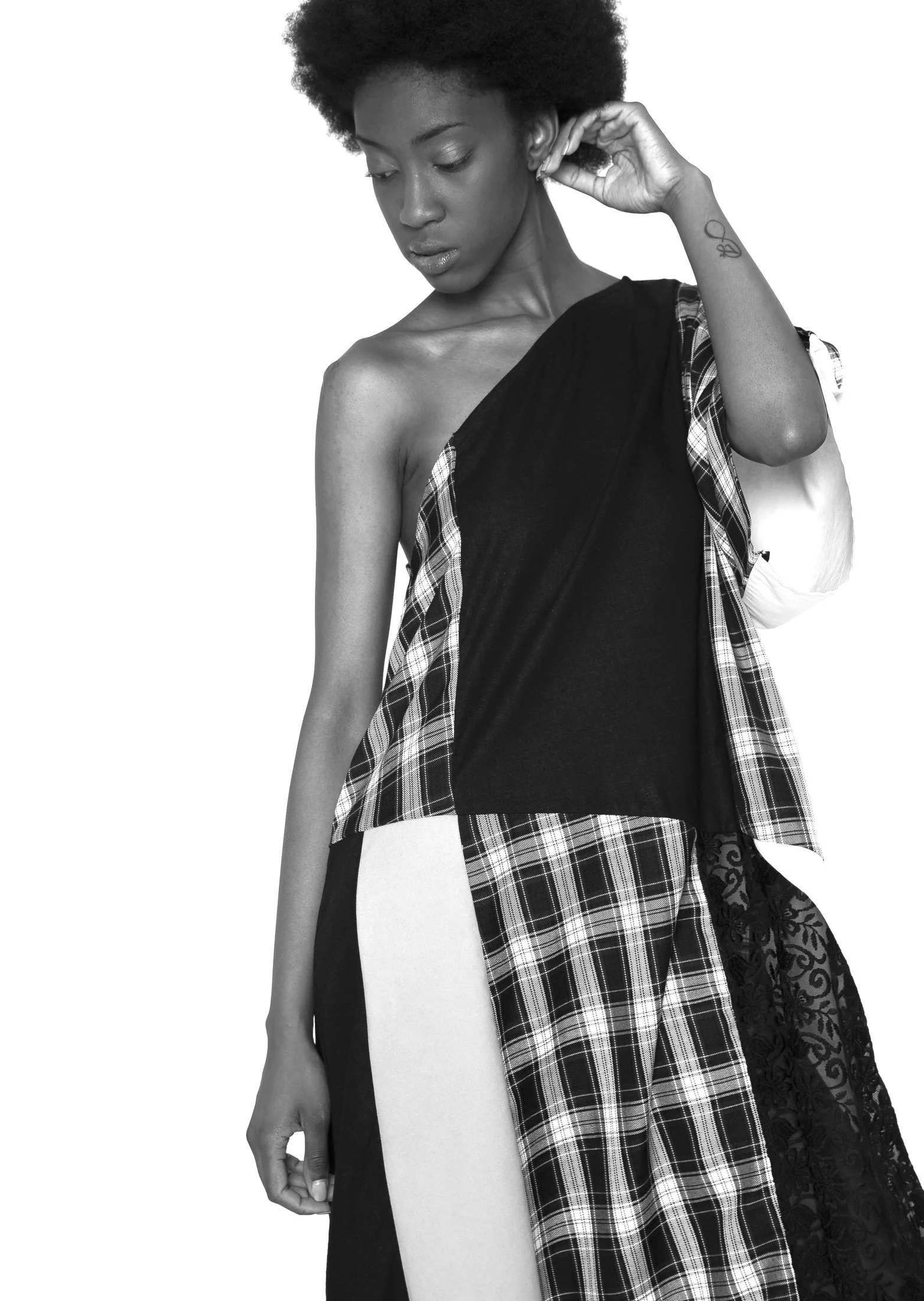 Zara Saberi — Minimal fashion design emphasizing simplicity and movement.