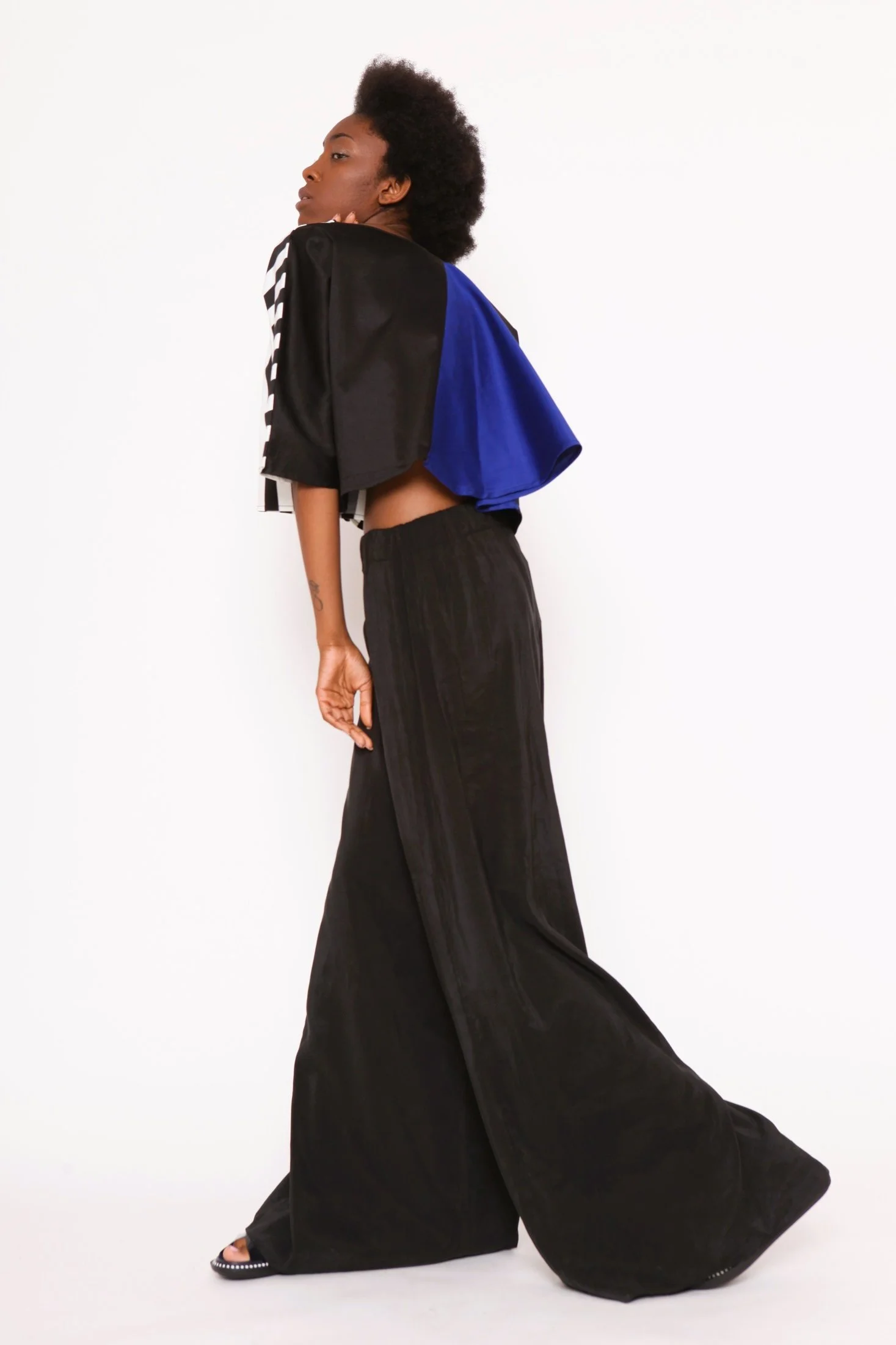 Zara Saberi — Contemporary garment balancing structure and simplicity in The Simple Line.