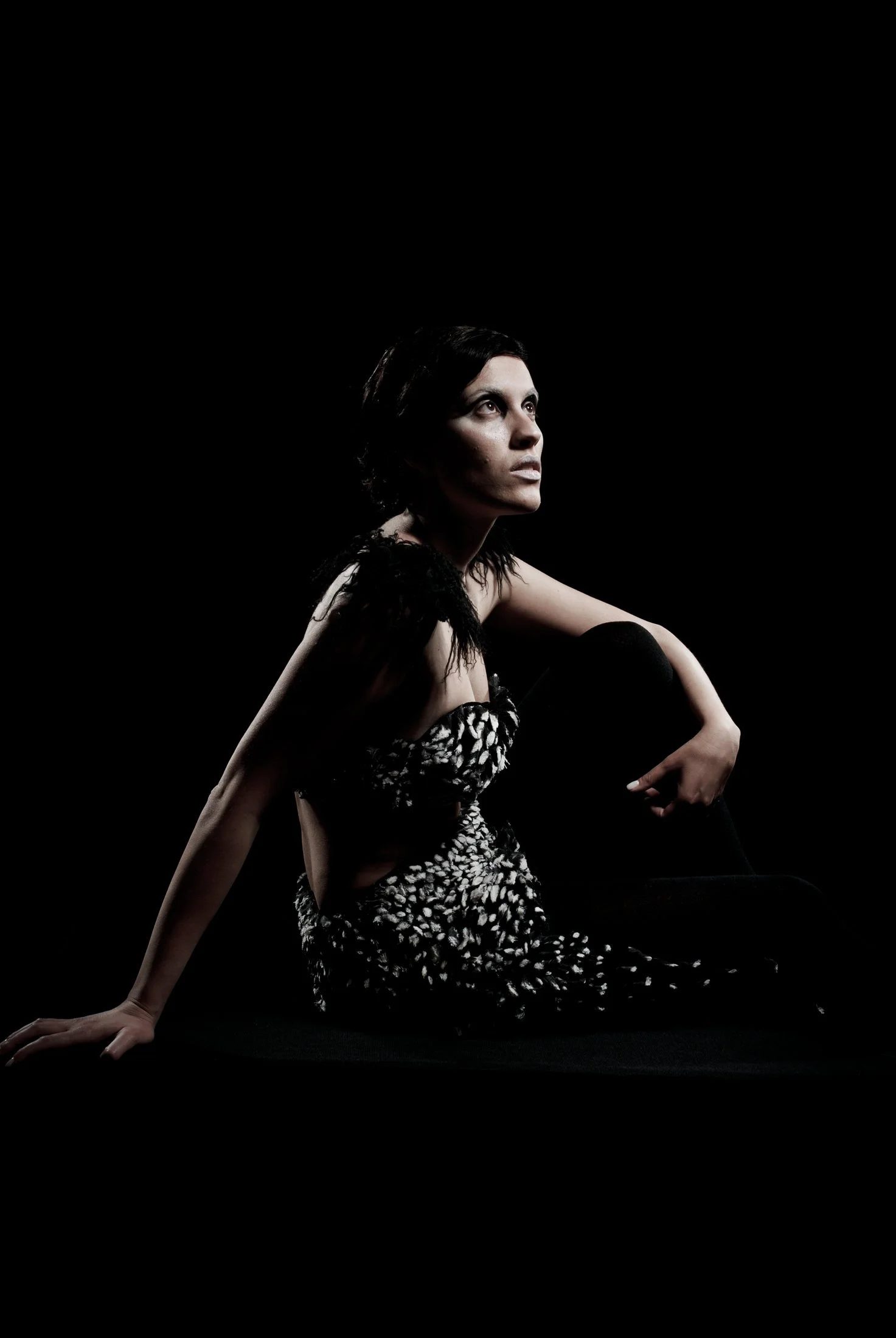 Model wearing the Beneath the Surface garment by Zara Saberi, exploring experimental black-and-white textile design.