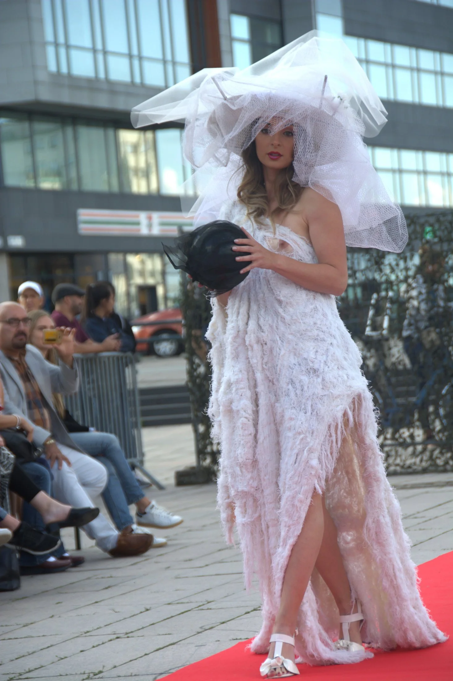 Zara Saberi — Runway performance from the I Don't Care collection featuring conceptual silhouettes.