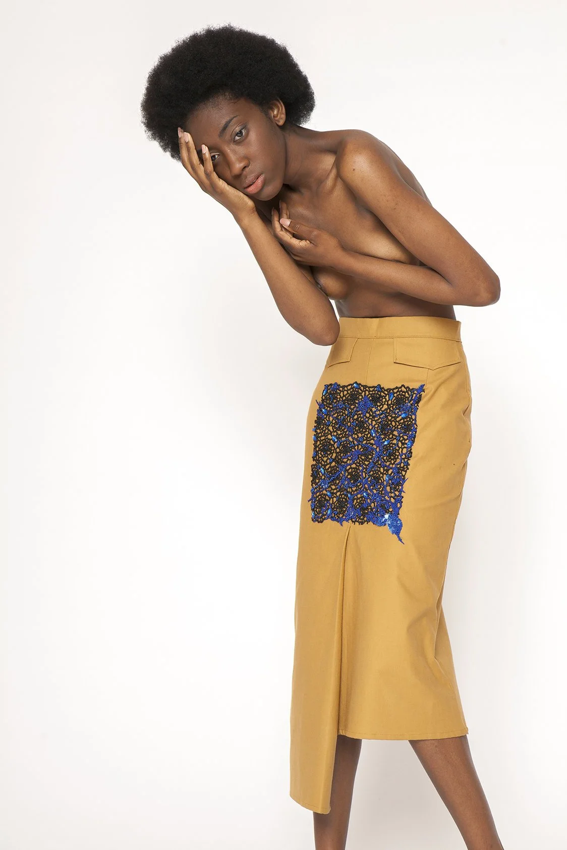 Zara Saberi — Handcrafted fashion piece featuring embroidery and guipure lace.