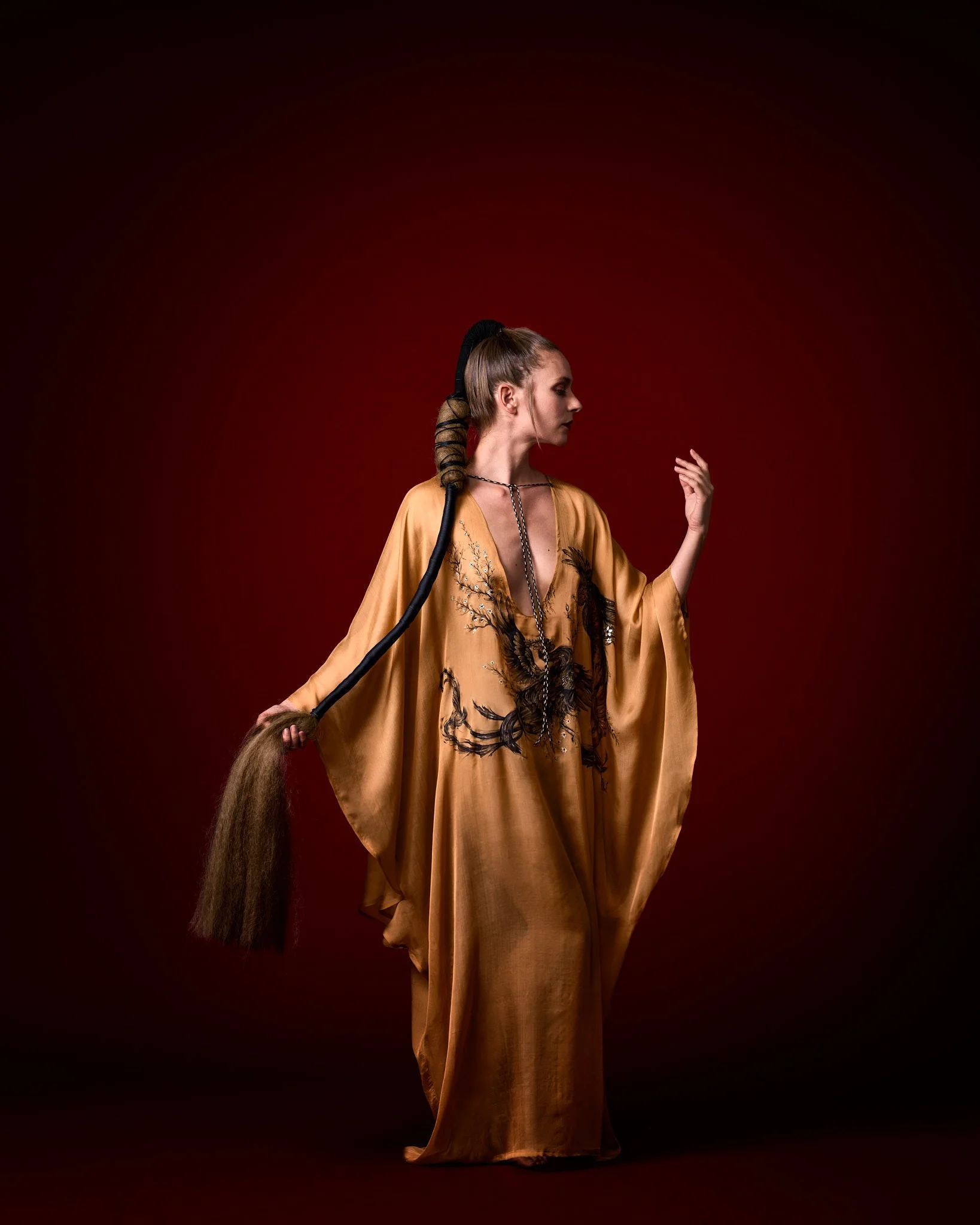 Zara Saberi — Contemporary wearable artwork created on luxurious Italian silk with hand-painted Persian miniature motifs, photographed in Madrid, Spain.