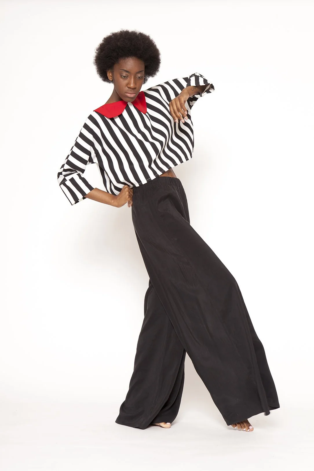 Zara Saberi — Cotton fashion piece balancing structure, body and space.