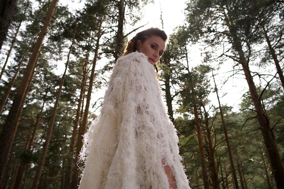 Zara Saberi — White conceptual garment from the Liberta project exploring freedom and identity, created in Italy and photographed in Madrid, Spain.