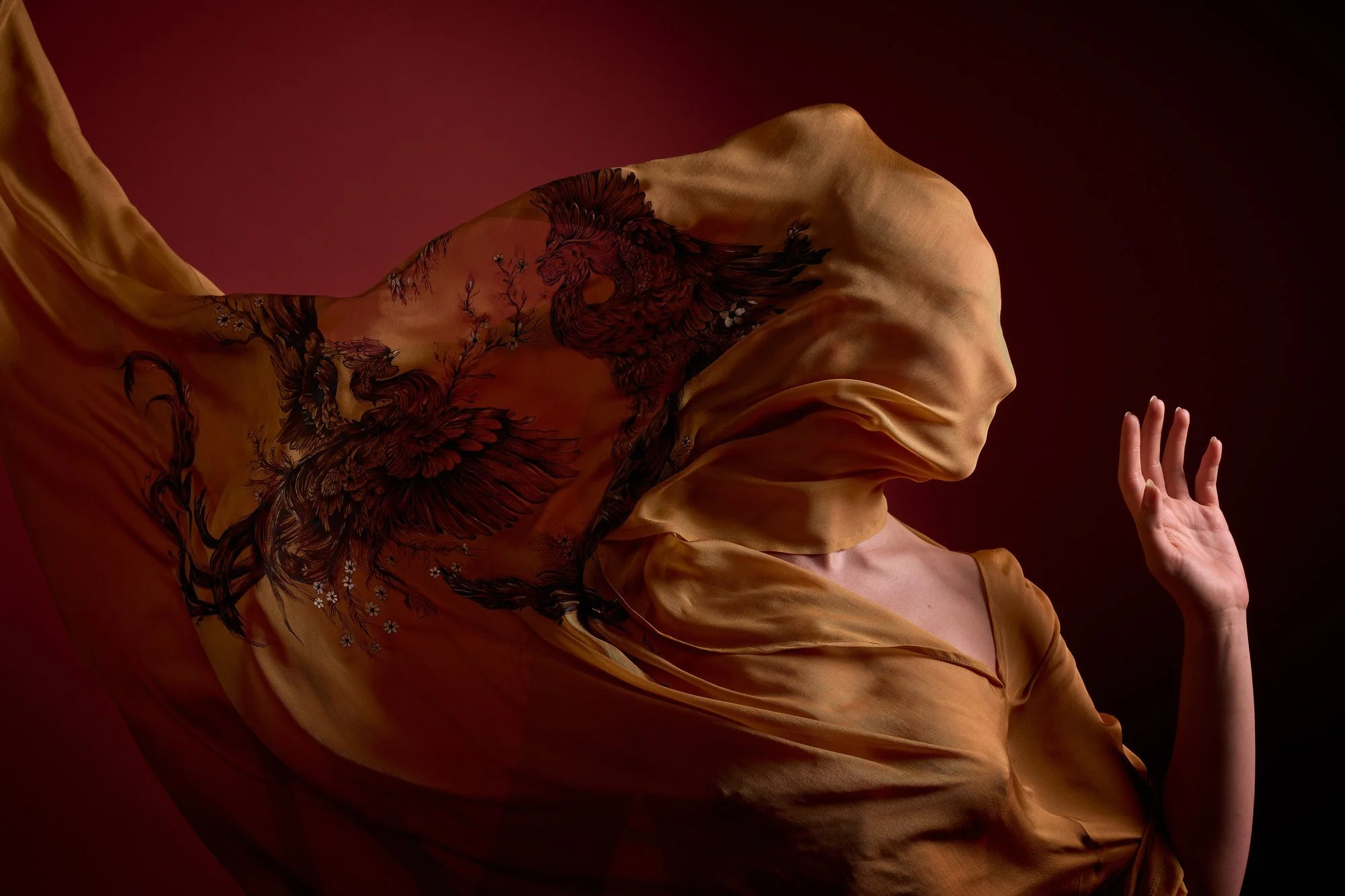 An editorial photo of the Gold Kaftan, hand painted by Zara Saberi, Persian Miniature