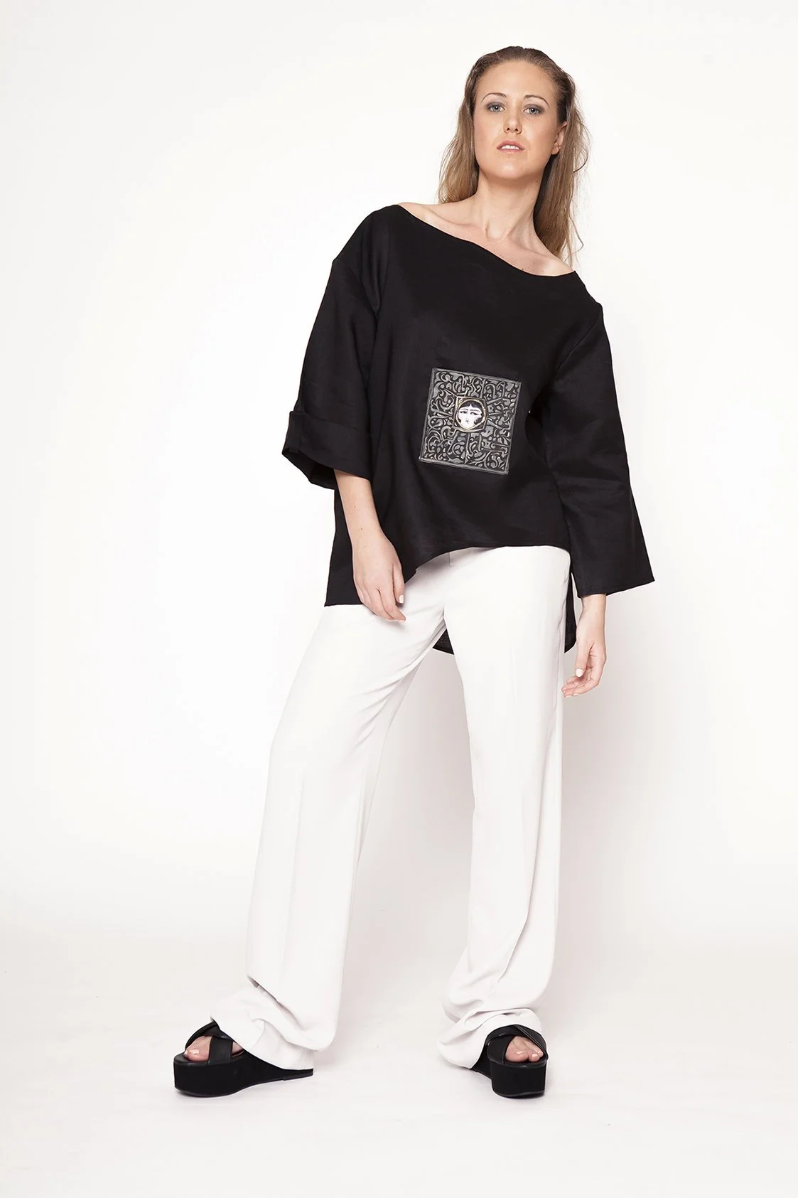 Zara Saberi — Wearable art exploring texture, craftsmanship and painted surfaces.