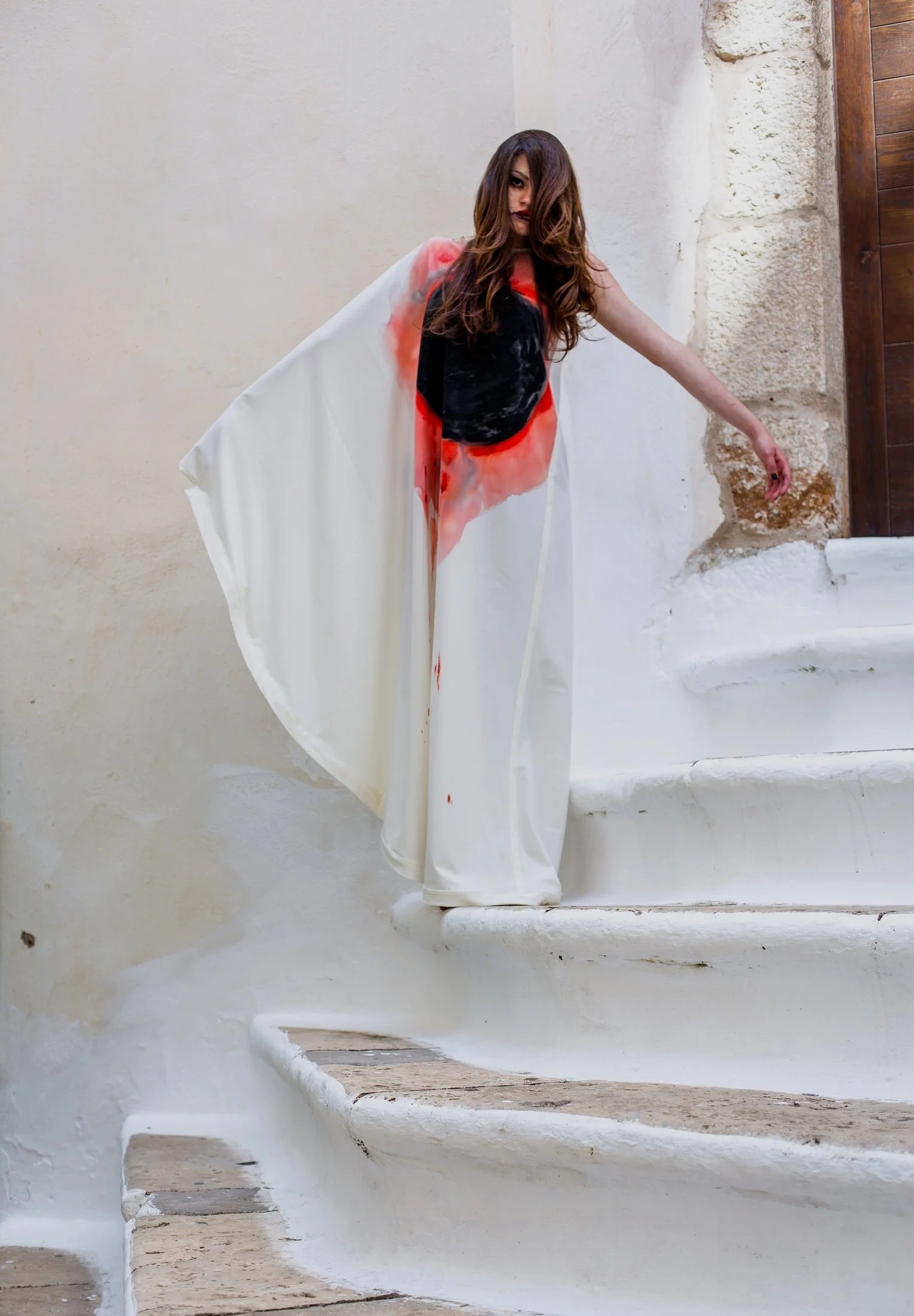 Zara Saberi — Artistic garment from the Woman VS Woman collection exploring silence through hand-painted textiles.