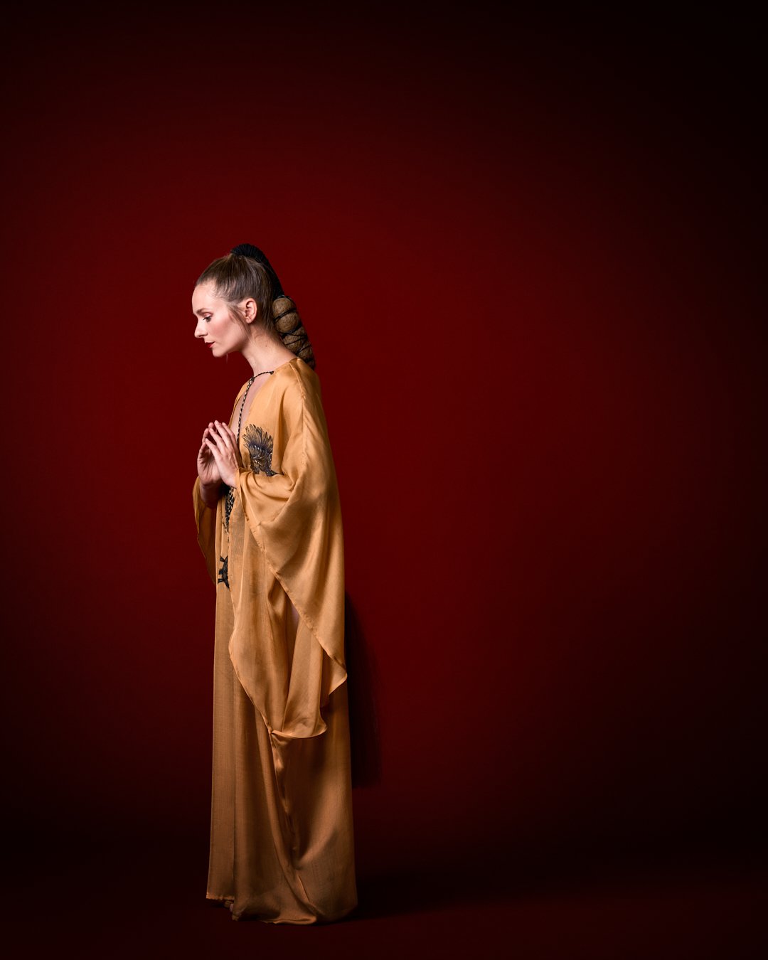 Zara Saberi — Wearable art piece featuring Persian miniature painting on silk and chiffon, photographed in Madrid, Spain.
