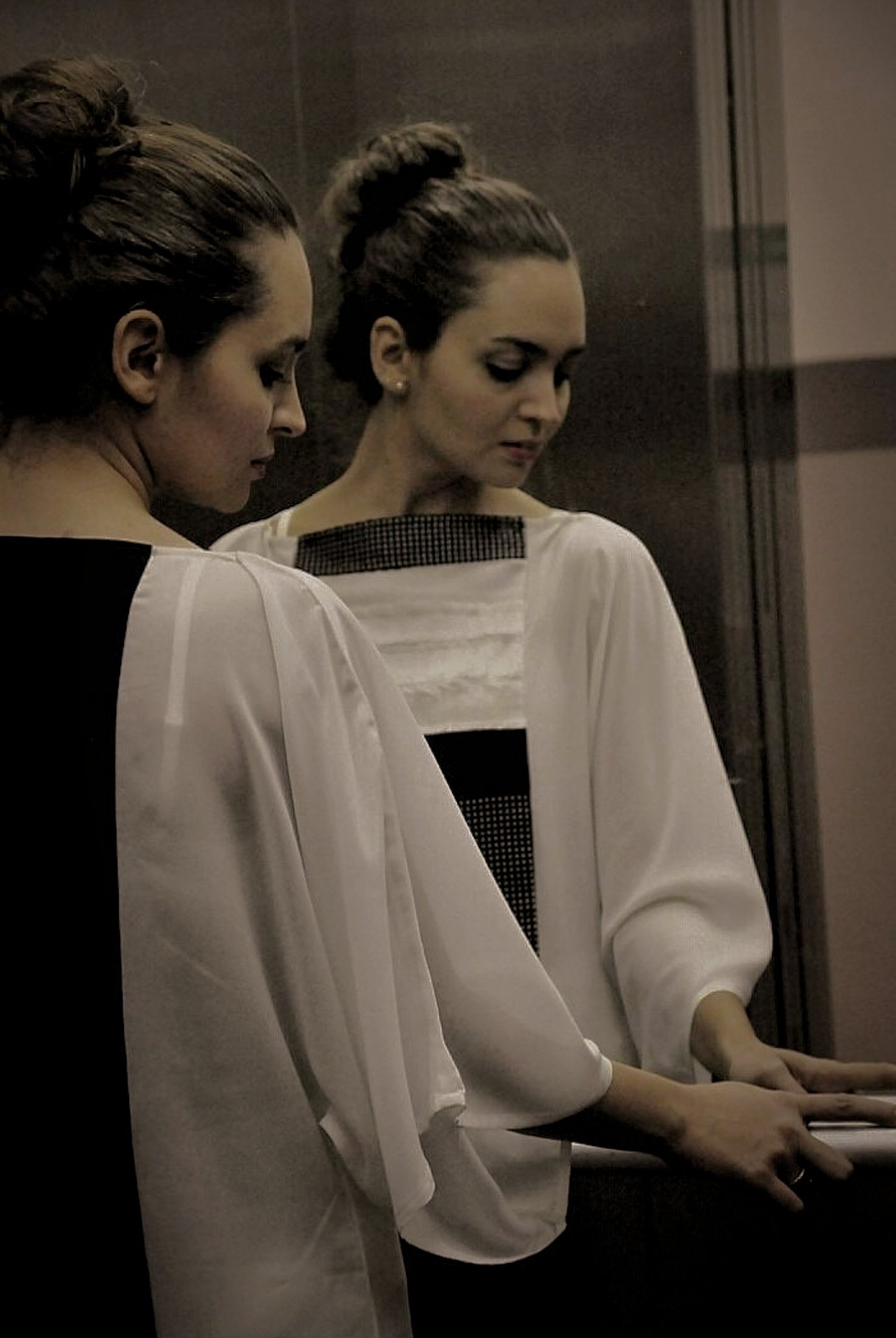 Zara Saberi — Silk and satin garment from the Once Upon a Time in Milan collection, defined by clean lines and precise tailoring.