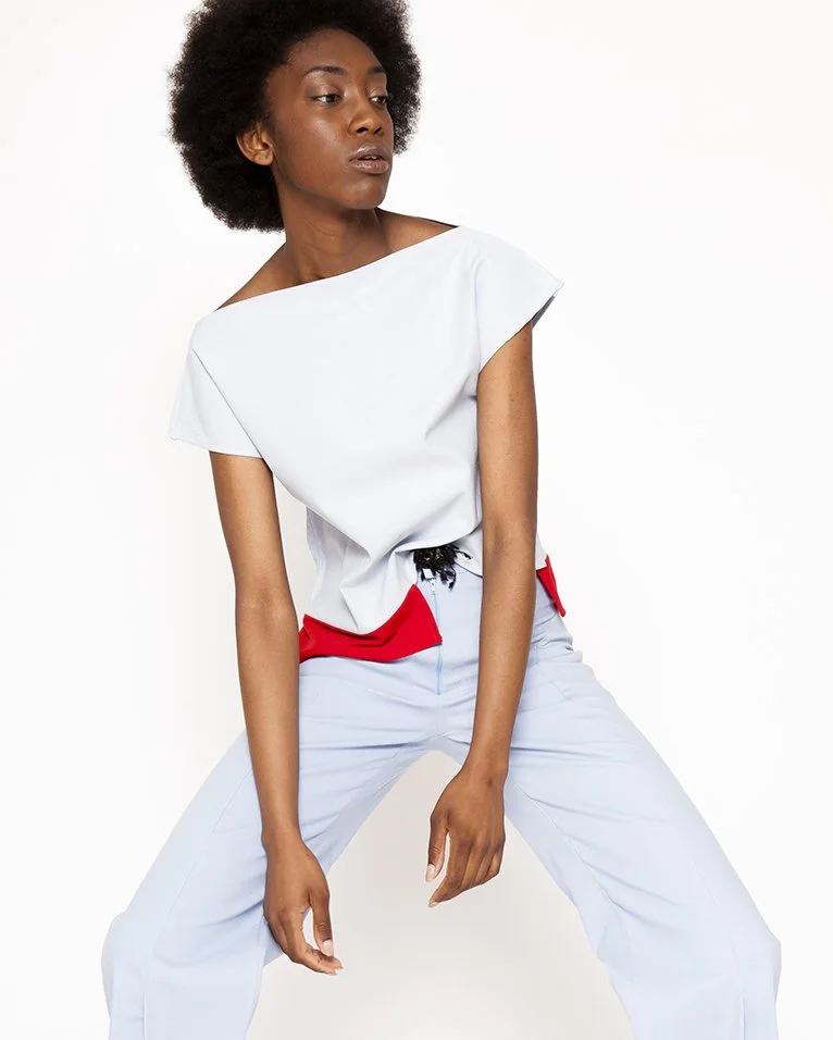 Zara Saberi — Minimal garment expressing rhythm through clean construction.
