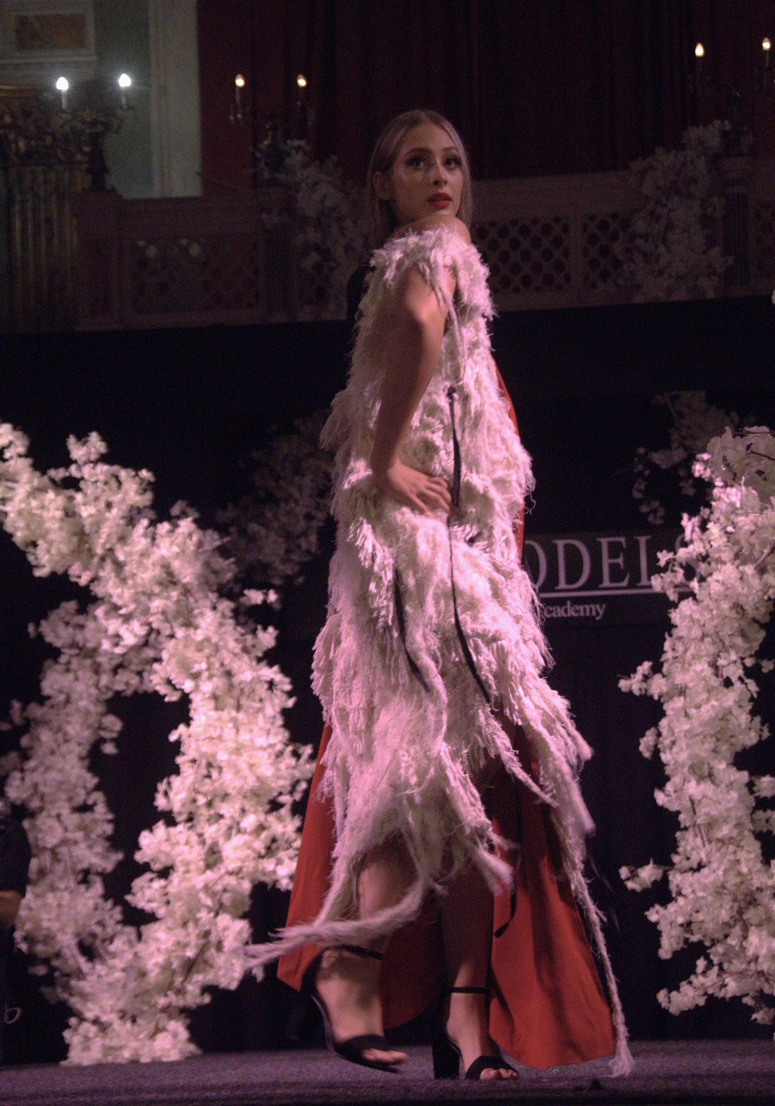 Zara Saberi — Lace garment from the I Don't Care collection combining structure and transparency.