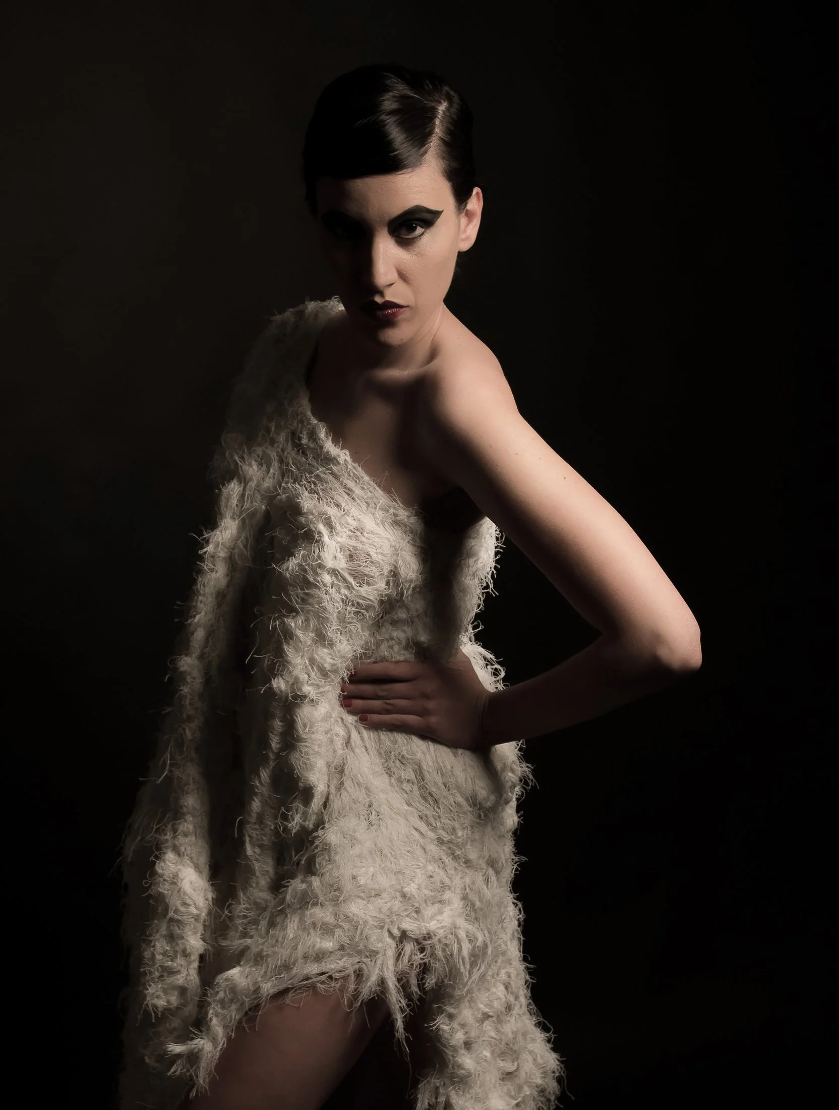 Artistic fashion photography from the Liberta collection by Zara Saberi exploring sculptural textile design.