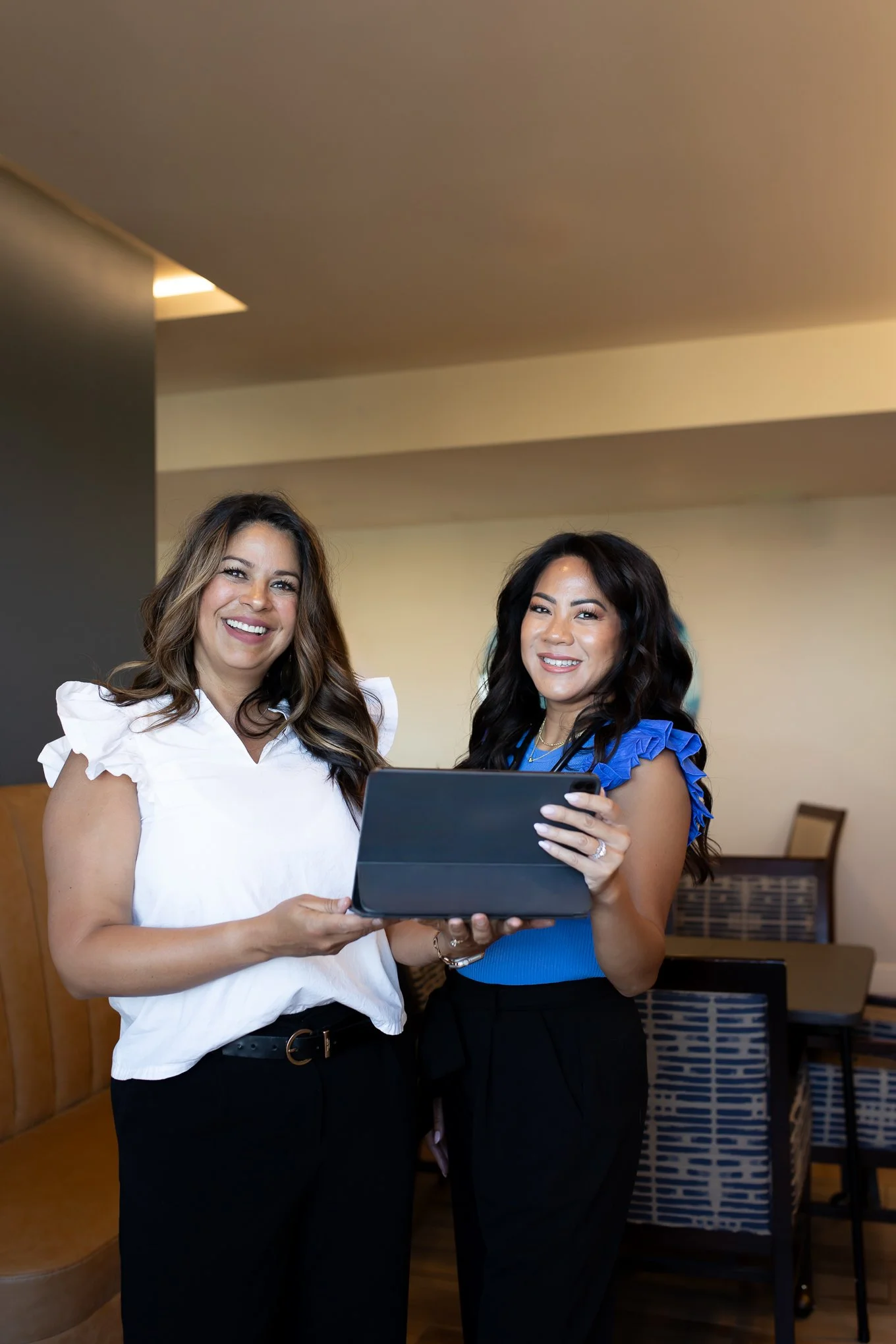 Two women smiling