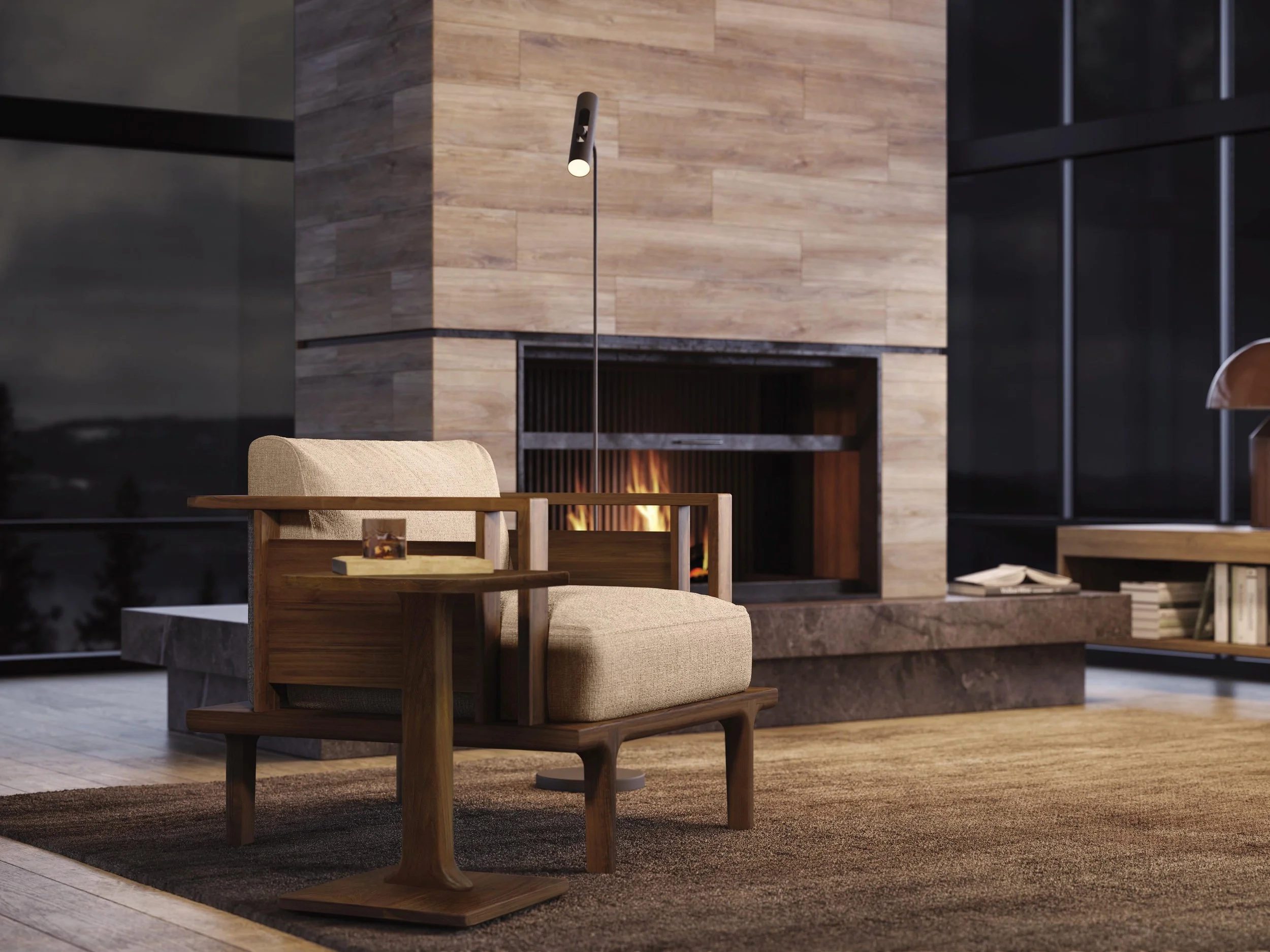 A modern living room features a beige armchair with wooden armrests in front of a fireplace with wooden paneling. There are black and dark gray cabinet doors on either side, and a floor lamp with a cylindrical black shade and white light is positioned near the fireplace. A small wooden side table holds a decorative object, and part of a wooden bookshelf filled with books is visible on the right. The room has a warm atmosphere with wooden flooring and contemporary decor.