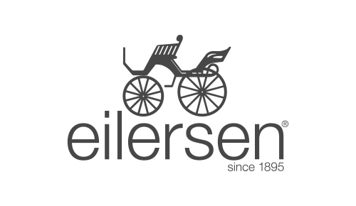 Logo of a bicycle with a basket and a flag above the brand name 'Eillersen' and the text 'since 1895'.
