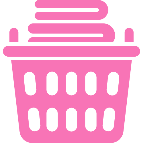 adhd mama life Pink laundry basket with folded towels inside.