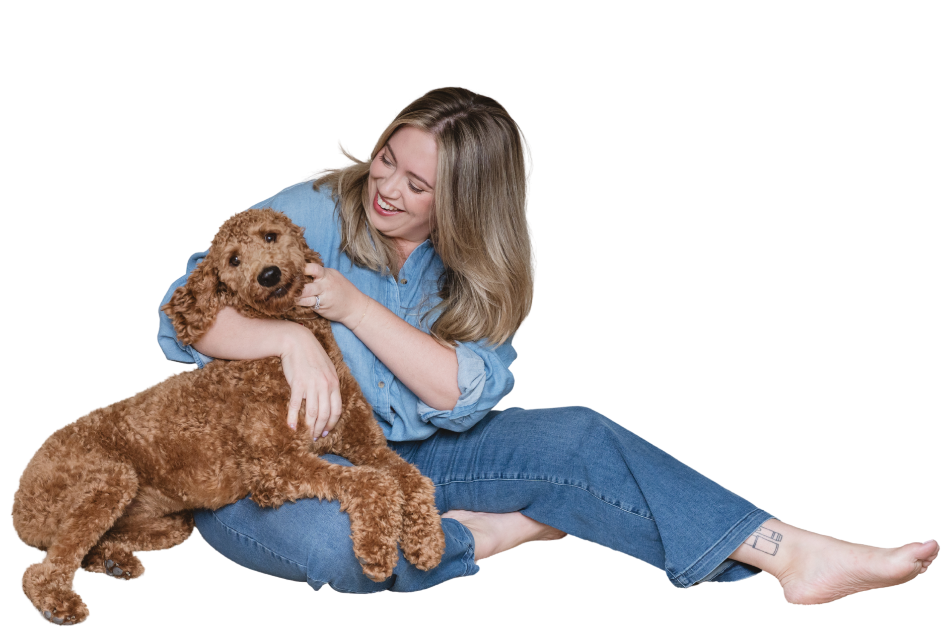Kim, founder of ADHD Mama Life Coaching smiling with dog