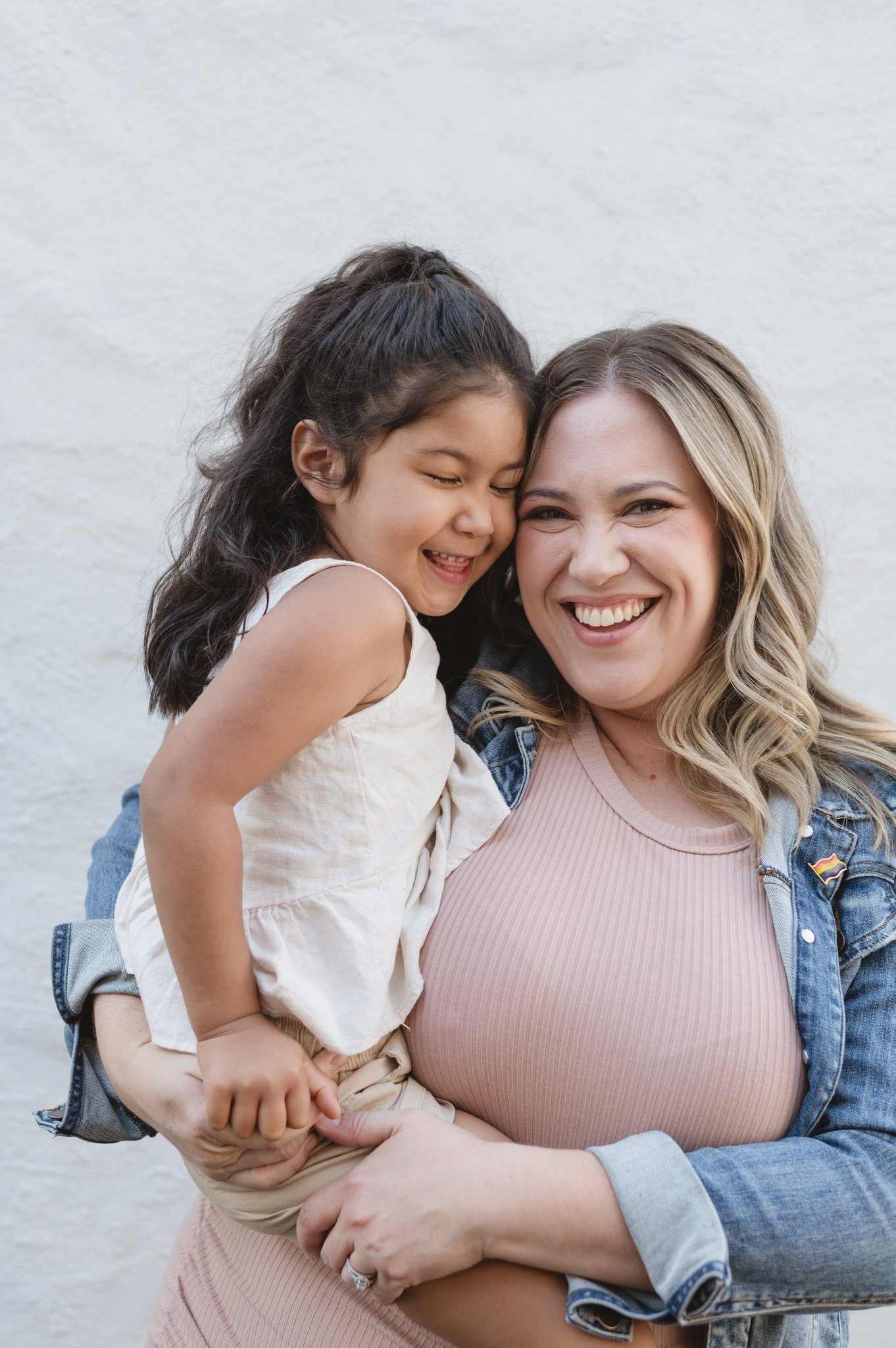 adhd mama life coach kim with daughter smiling and laughing