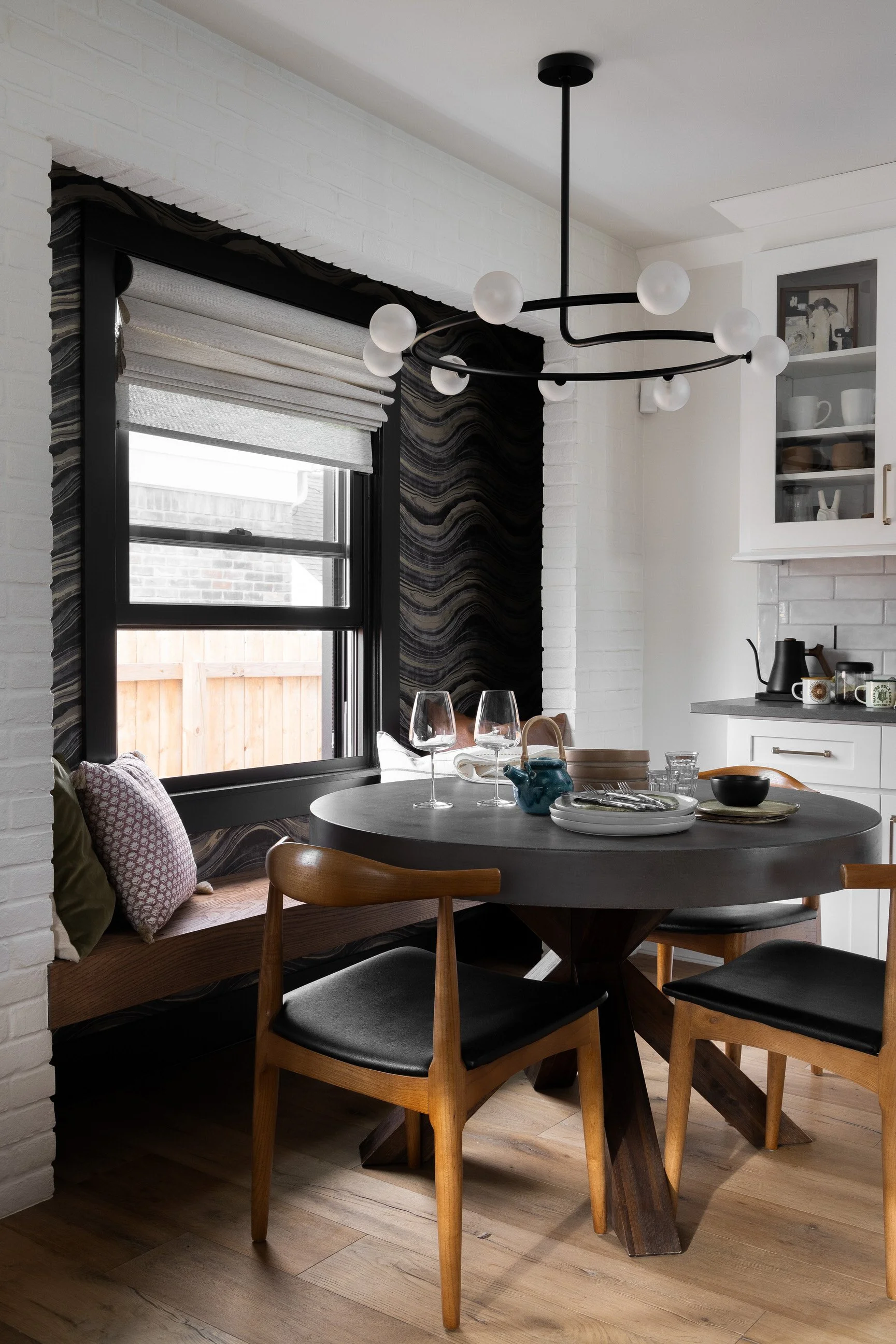 Thoughtfully designed kitchen nook with round table