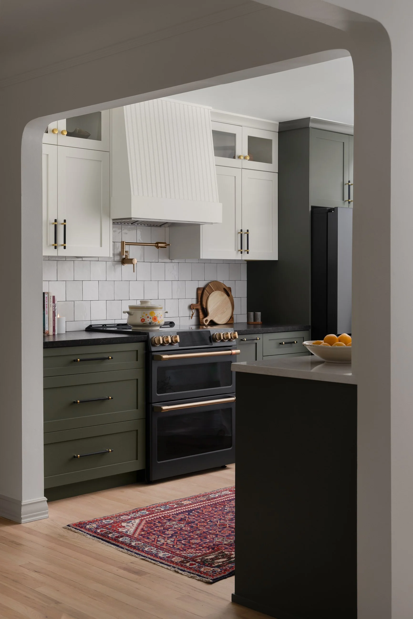 Modern classic kitchen design with dark cabinetry