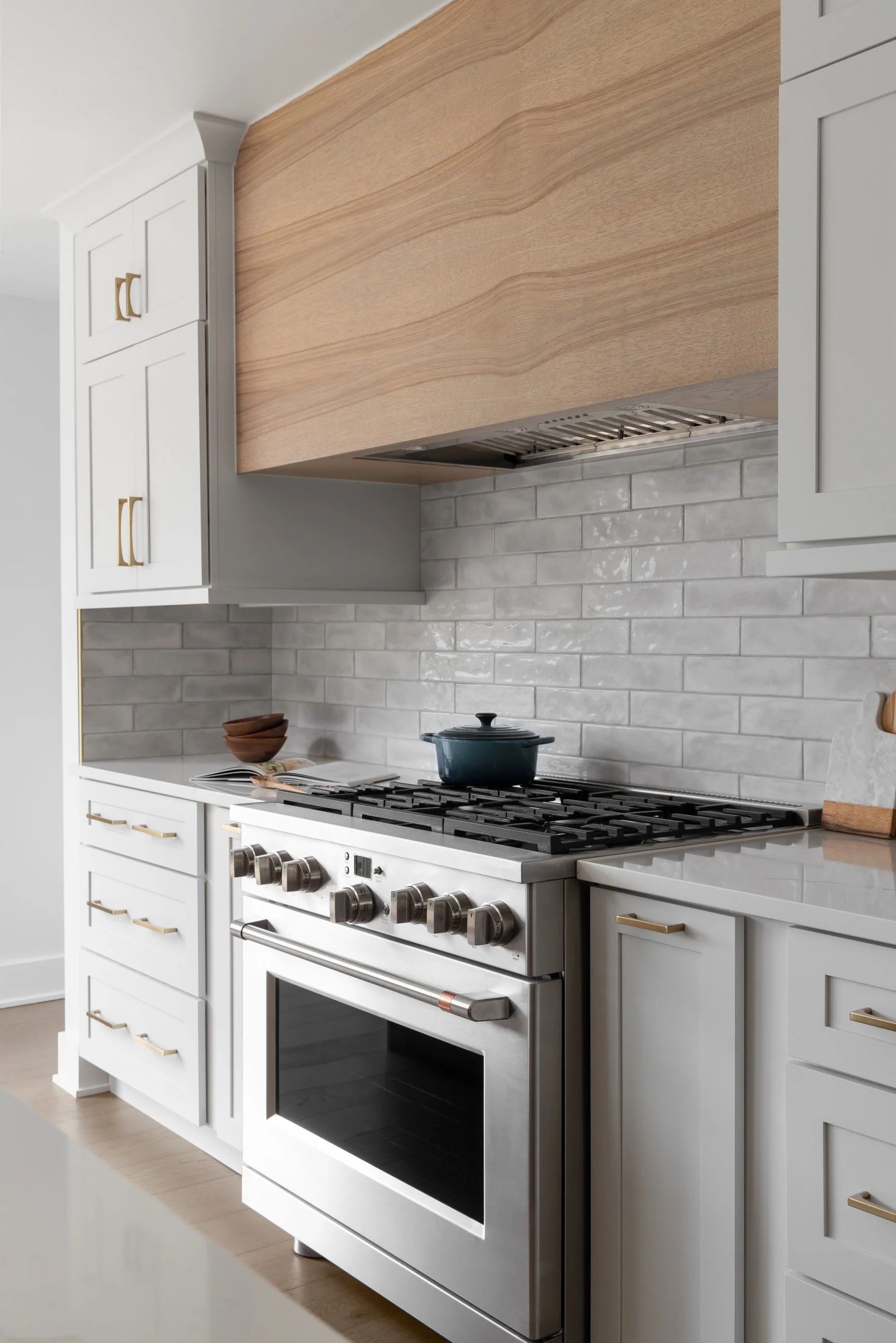 Kitchen range with custom hood vent design