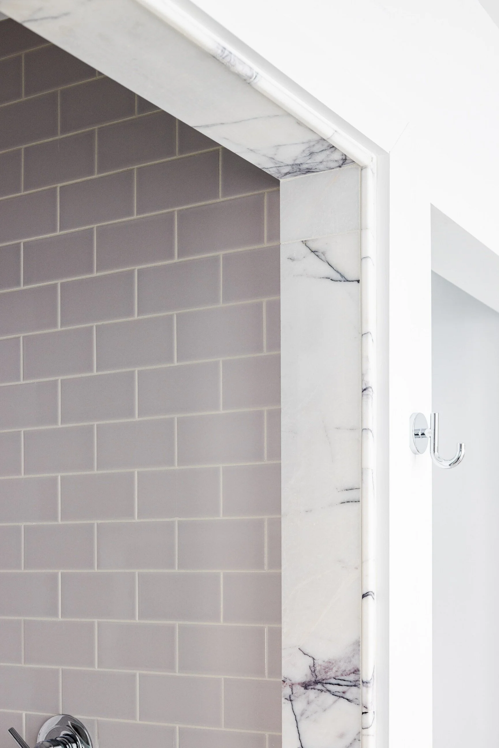 Custom marble trim for bathroom layout design