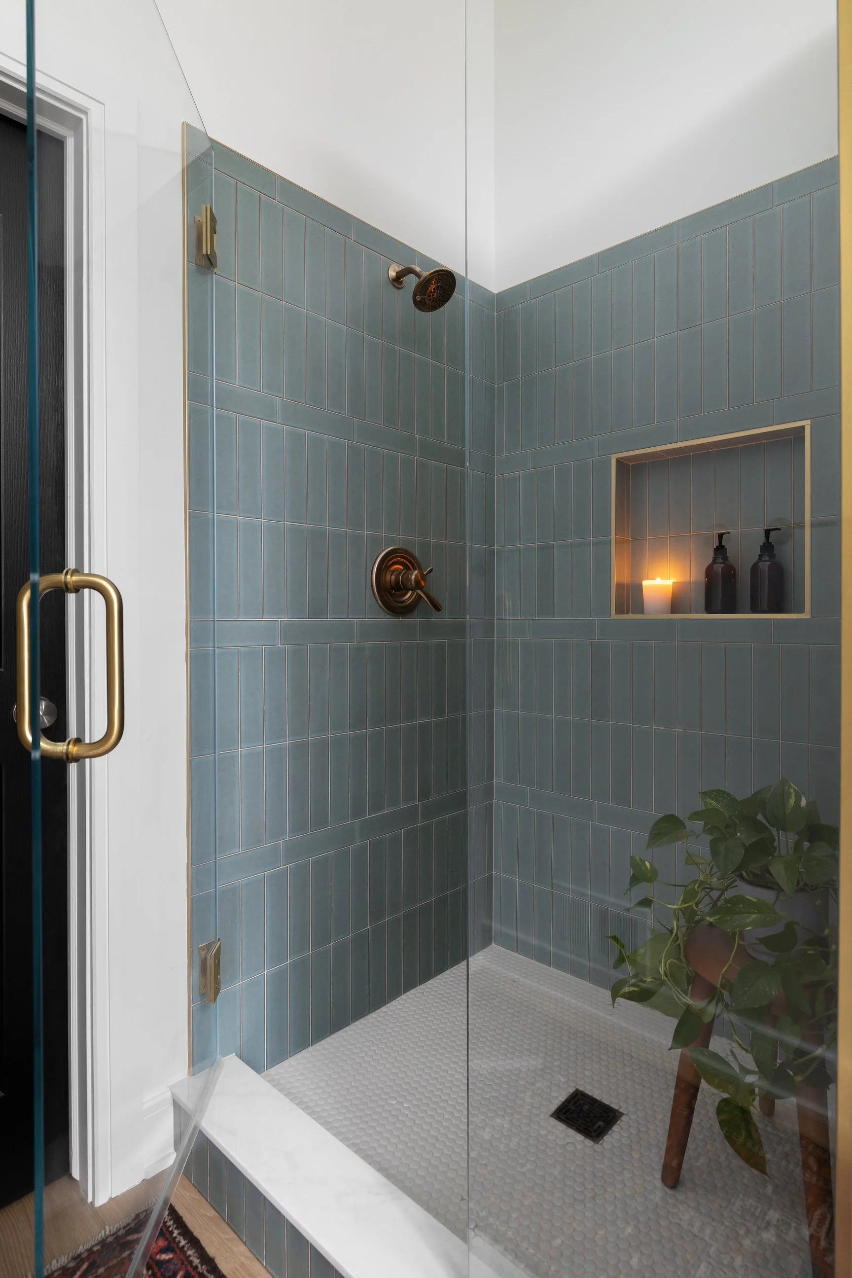 Blue tiling in modern bathroom