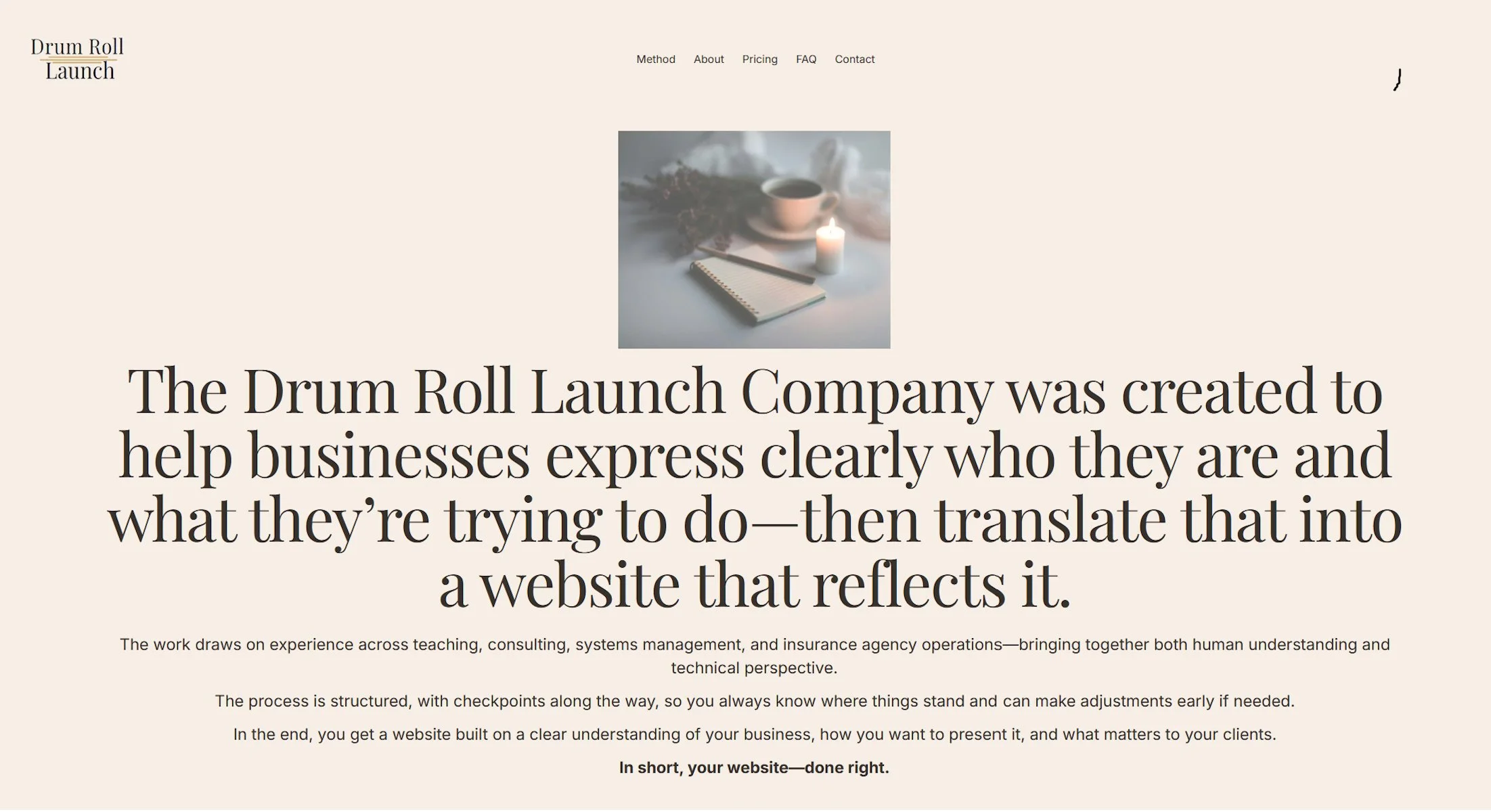 Screenshot of a website homepage for 'Drum Roll Launch', featuring a small image of a notebook, a candle, a cup of coffee, and some dried flowers on a white surface, with text describing the company's purpose and method.