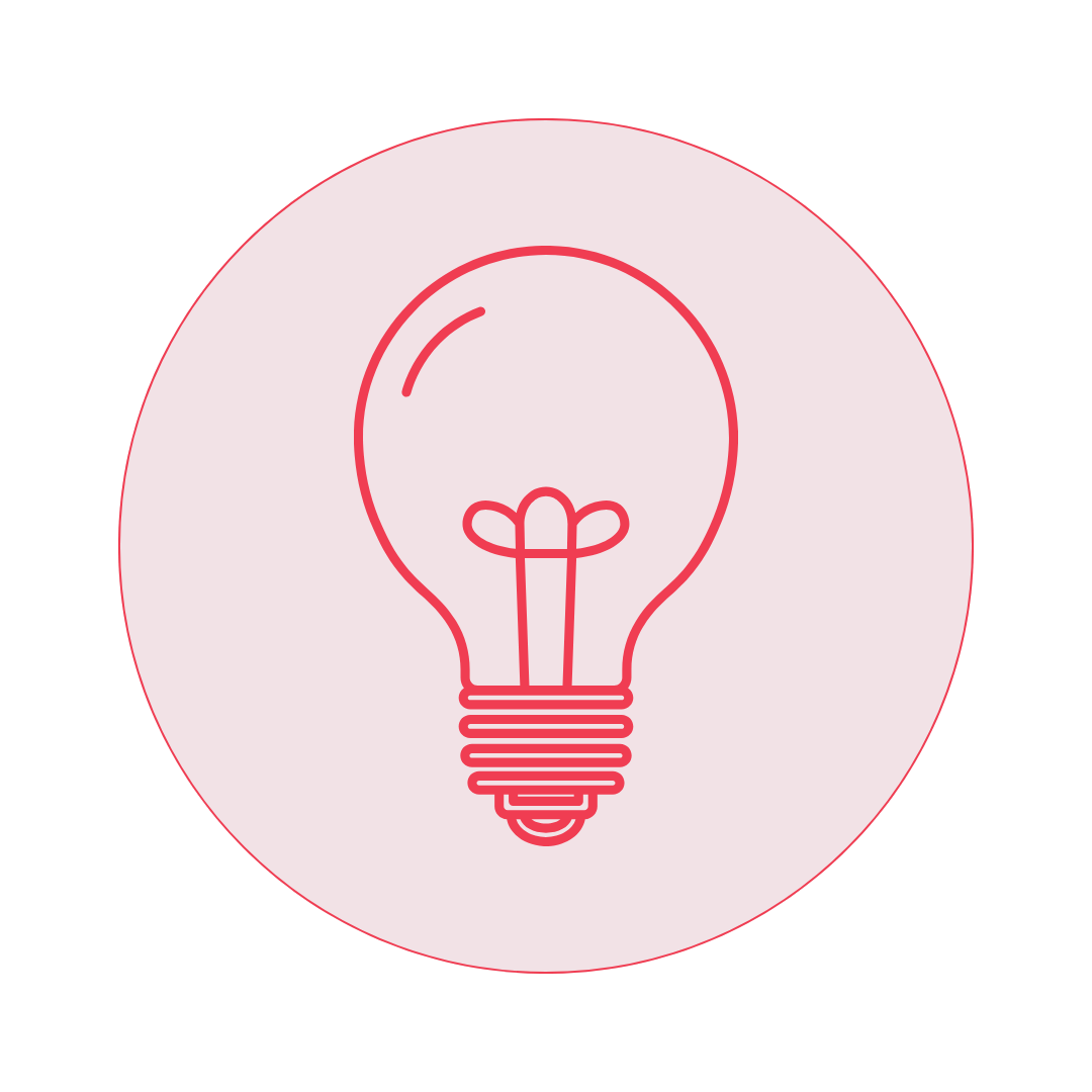Simple line drawing of a lightbulb within a pink circle.
