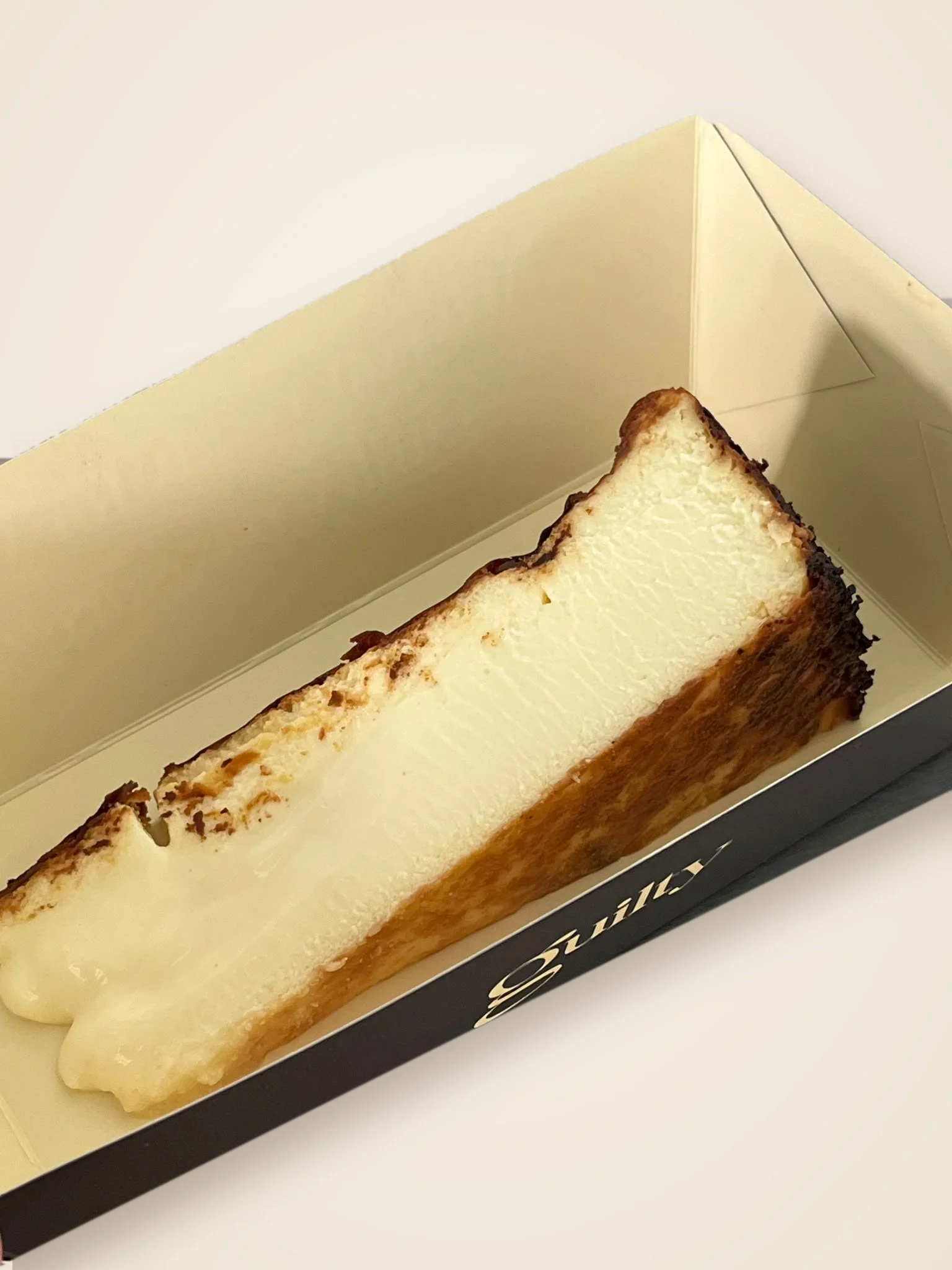 Close-up of the creamy center of a Gluten-Free Original Basque Cheesecake slice