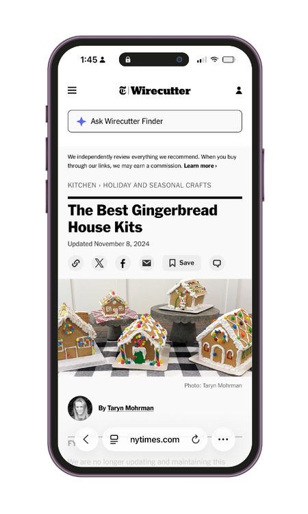 A smartphone screen displaying an article on Wirecutter's website about the best gingerbread house kits, featuring multiple decorated gingerbread houses.