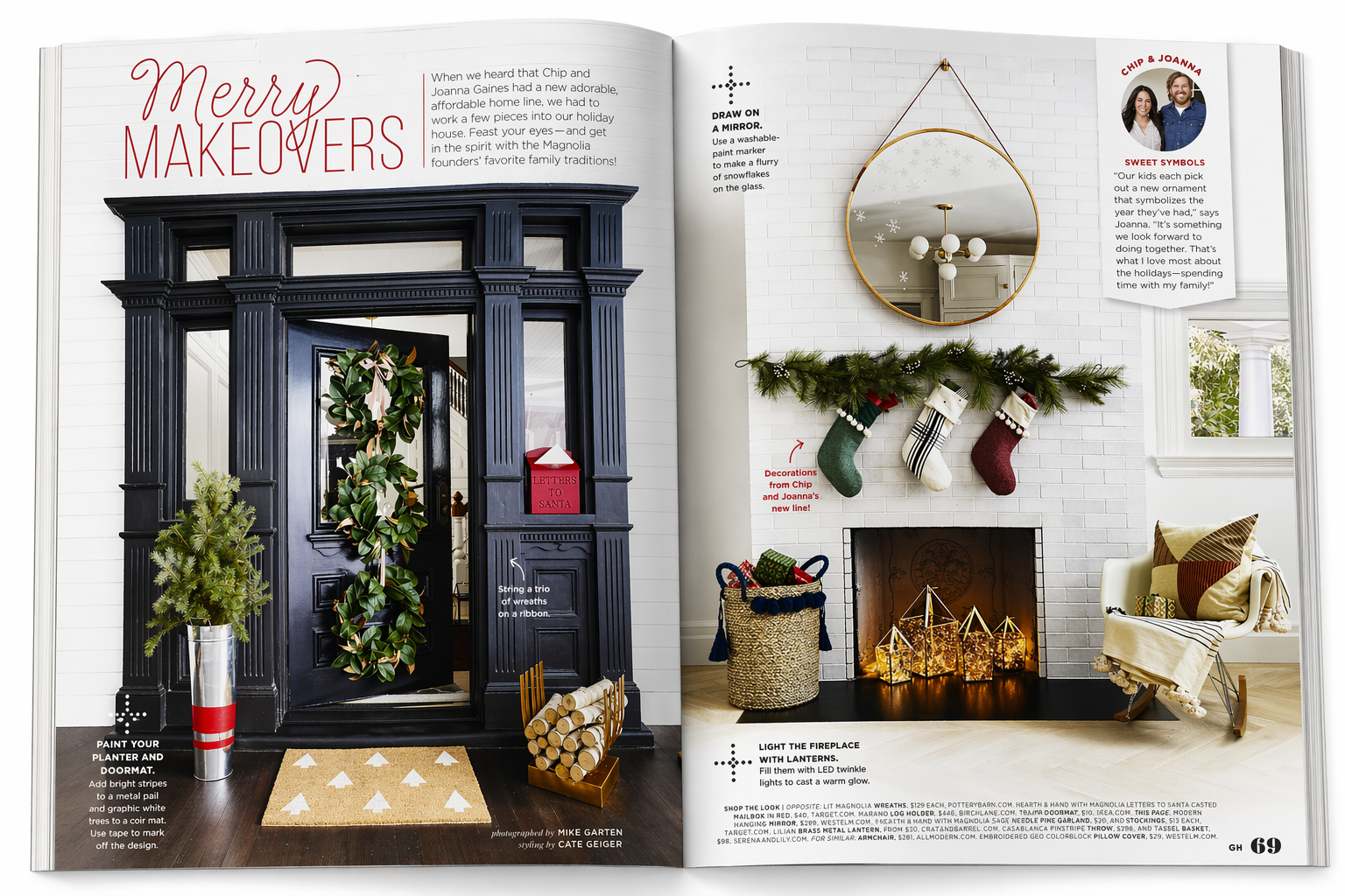 Christmas holiday living room decorated with stockings hanging above the fireplace, a round mirror on the wall, a wreath on the front door, a basket of firewood, and a cozy chair with throw pillows.