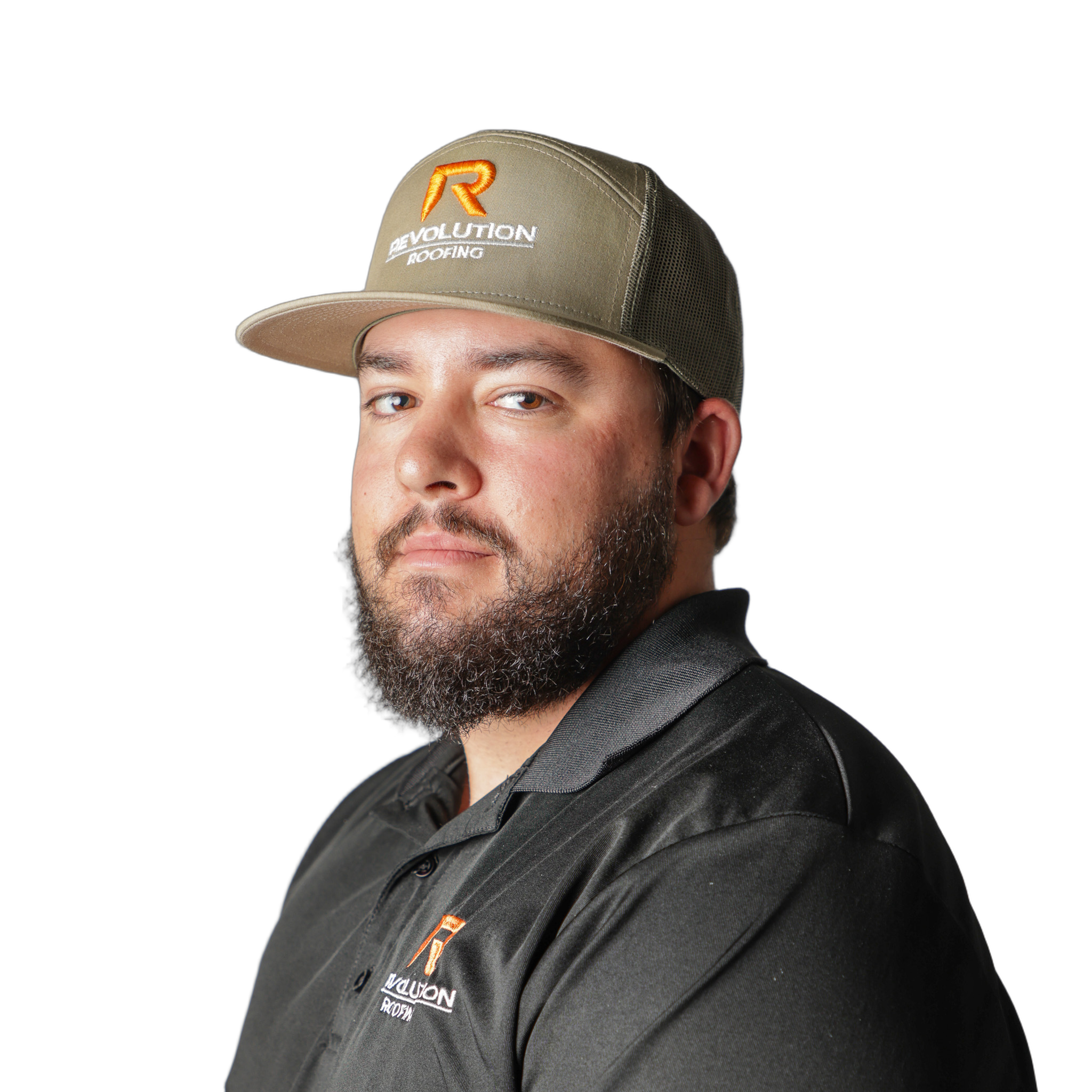 Close-up of a man wearing a black shirt and a khaki baseball cap with orange and white embroidery, partially visible from the nose up, against a white background.