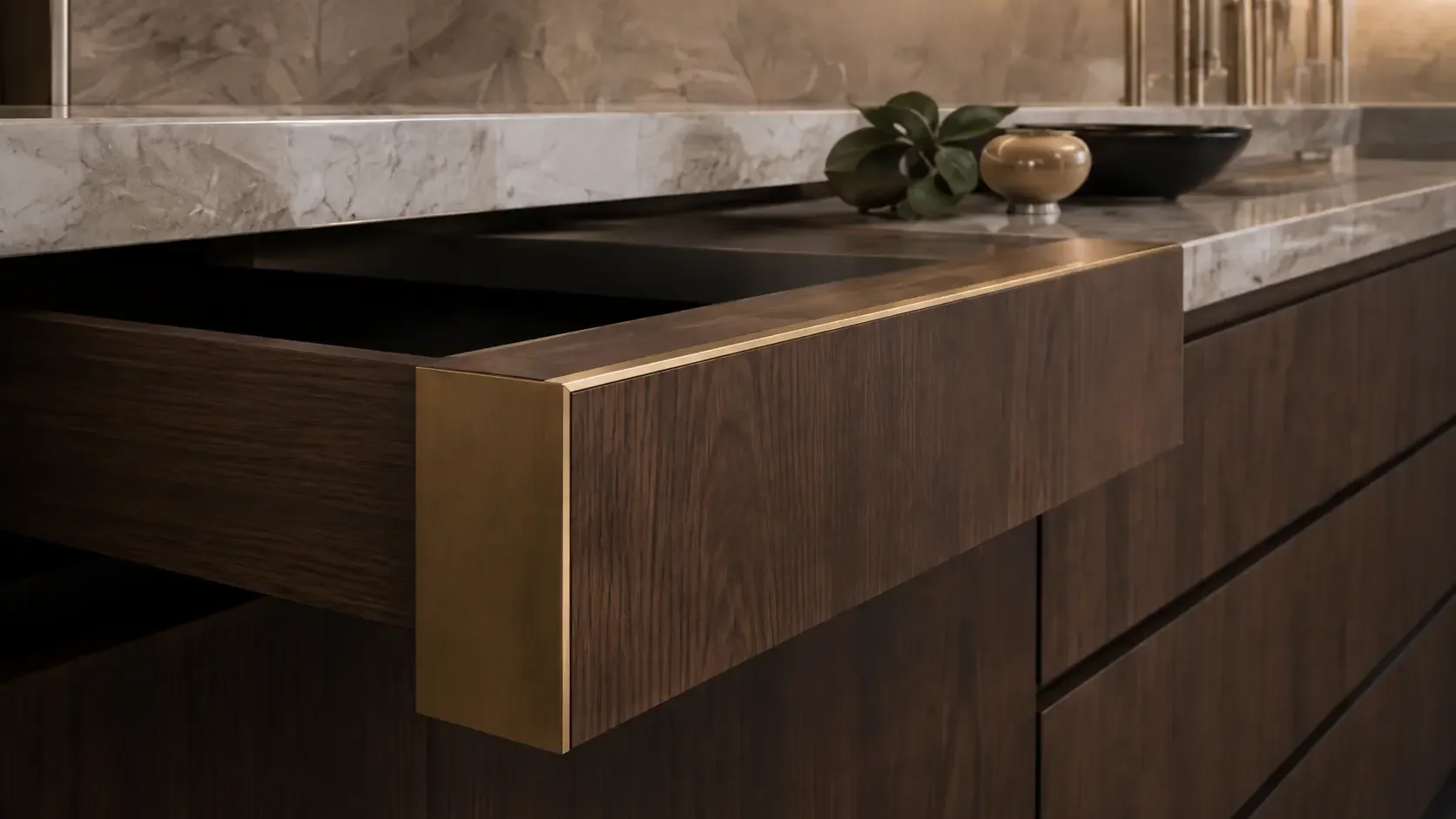 Close-up of precisely crafted walnut cabinetry beneath a natural stone worktop