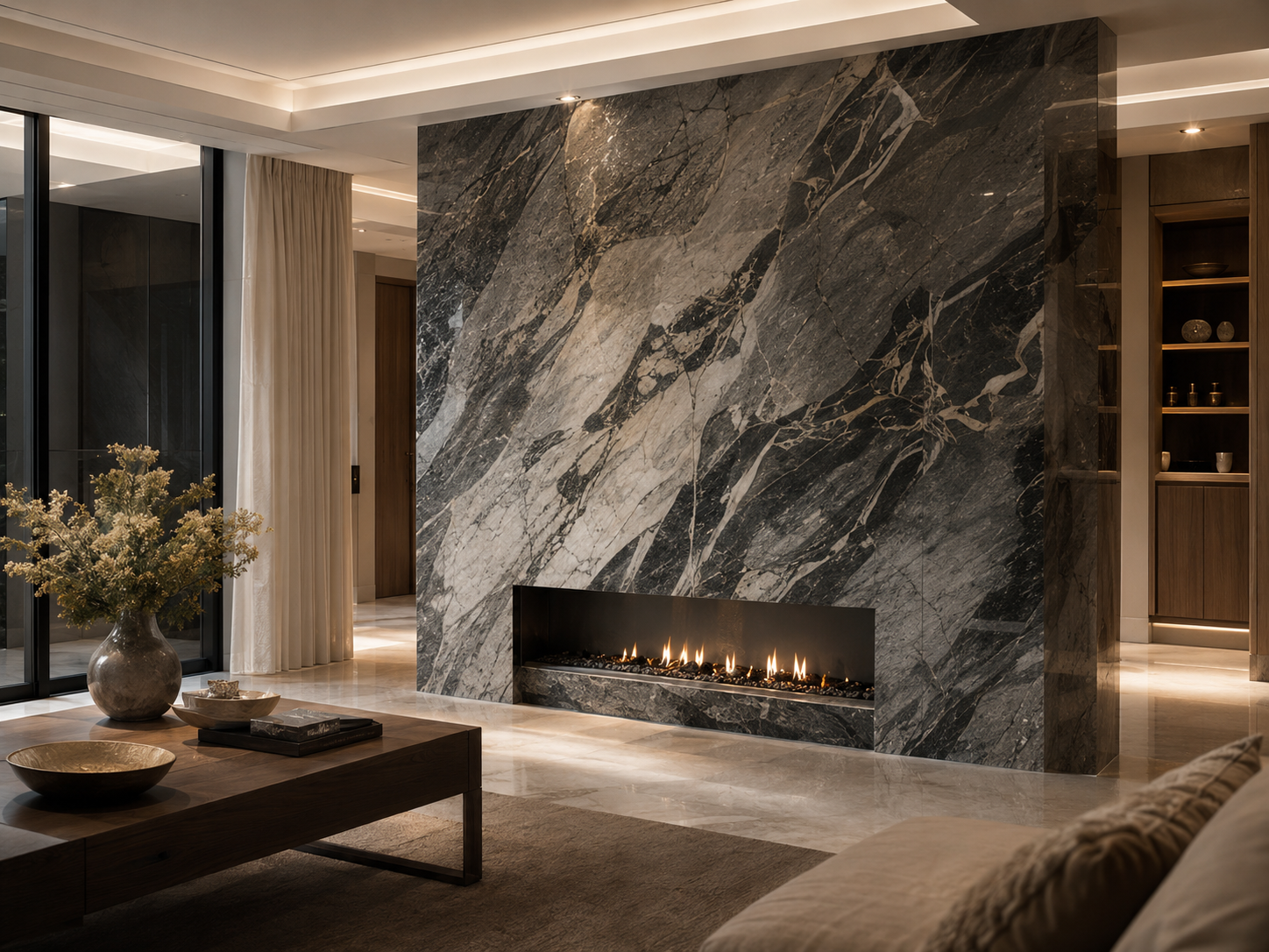 Bookmatched deep green marble feature wall with integrated fireplace