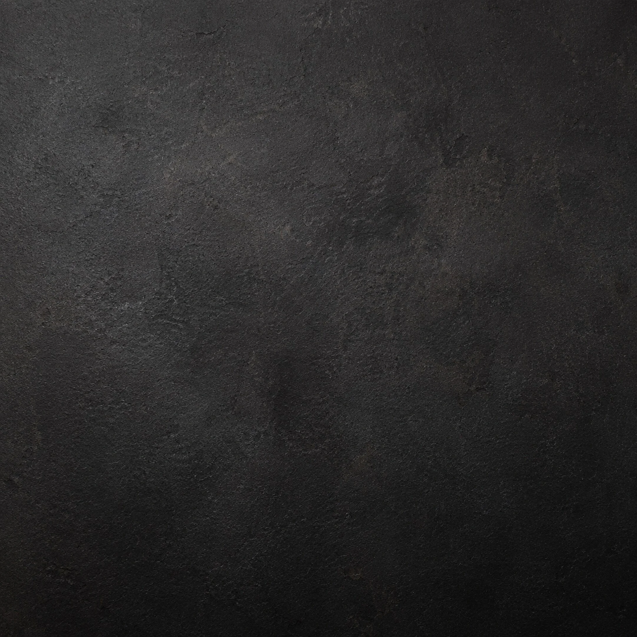 A deep, characterful finish with subtle tonal variation and a distinctive hand-finished appearance.