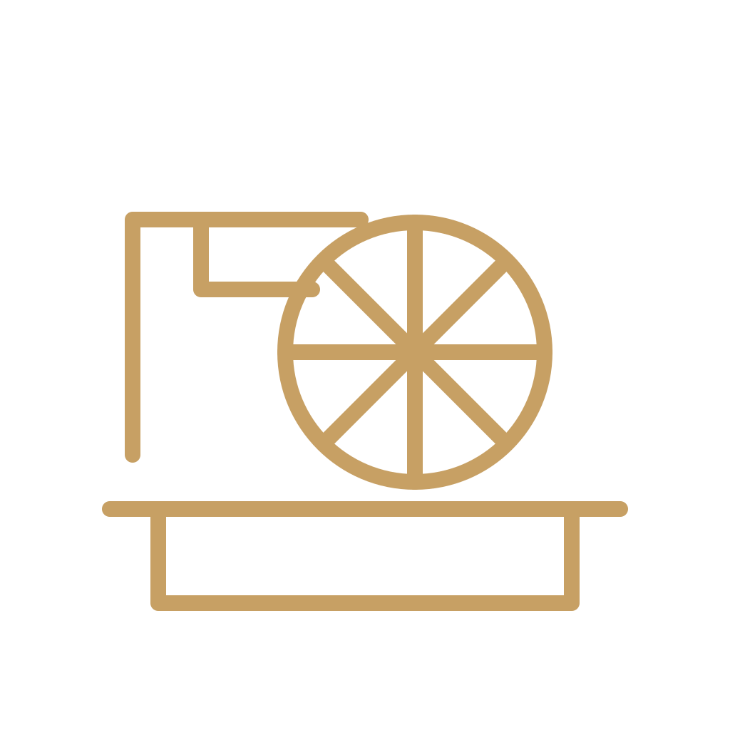 Outline of a citrus fruit slicing machine with a large sliced orange and a catch tray.