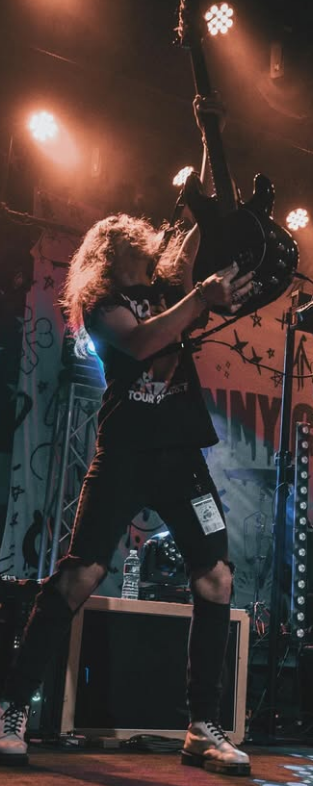 HXNTER HXWKINS modern rock artist, live rock performance, Michael Cavallo of Manic Drive, touring bassist Alec Stephens, modern radio-ready rock band, music video scene, studio recording session, and live stage. Hunter Hawkins Versvtile