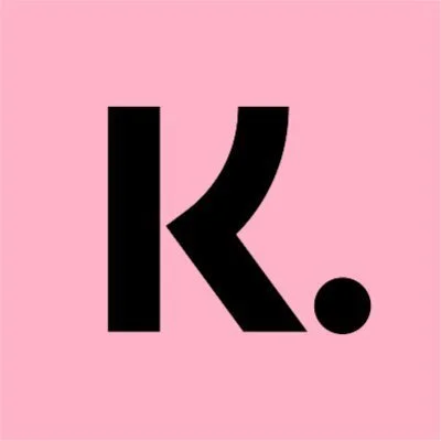 Bold black letter K followed by a period on a pink background.