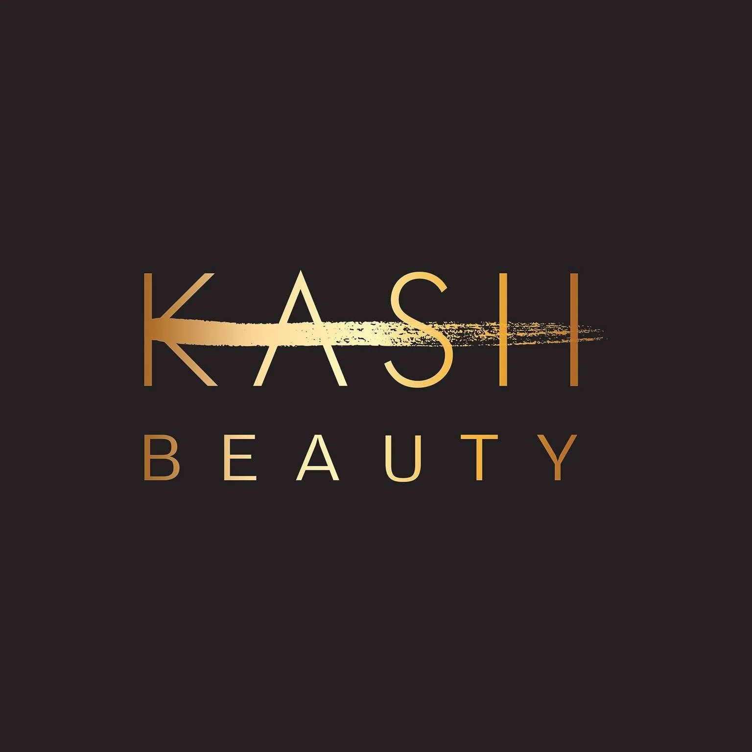 Black background with gold text that reads "KASHI BEAUTY" with a horizontal gold brush stroke running through the middle of the text.