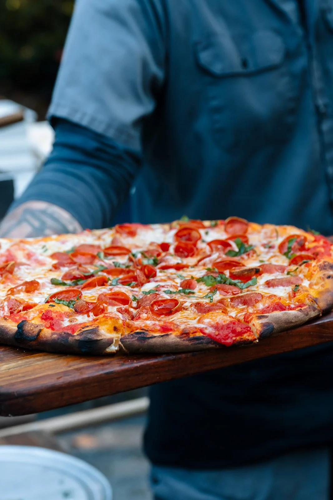 Winesong Wine Festival 2026 in Mendocino, California whole pizza with toppings offered at festival event