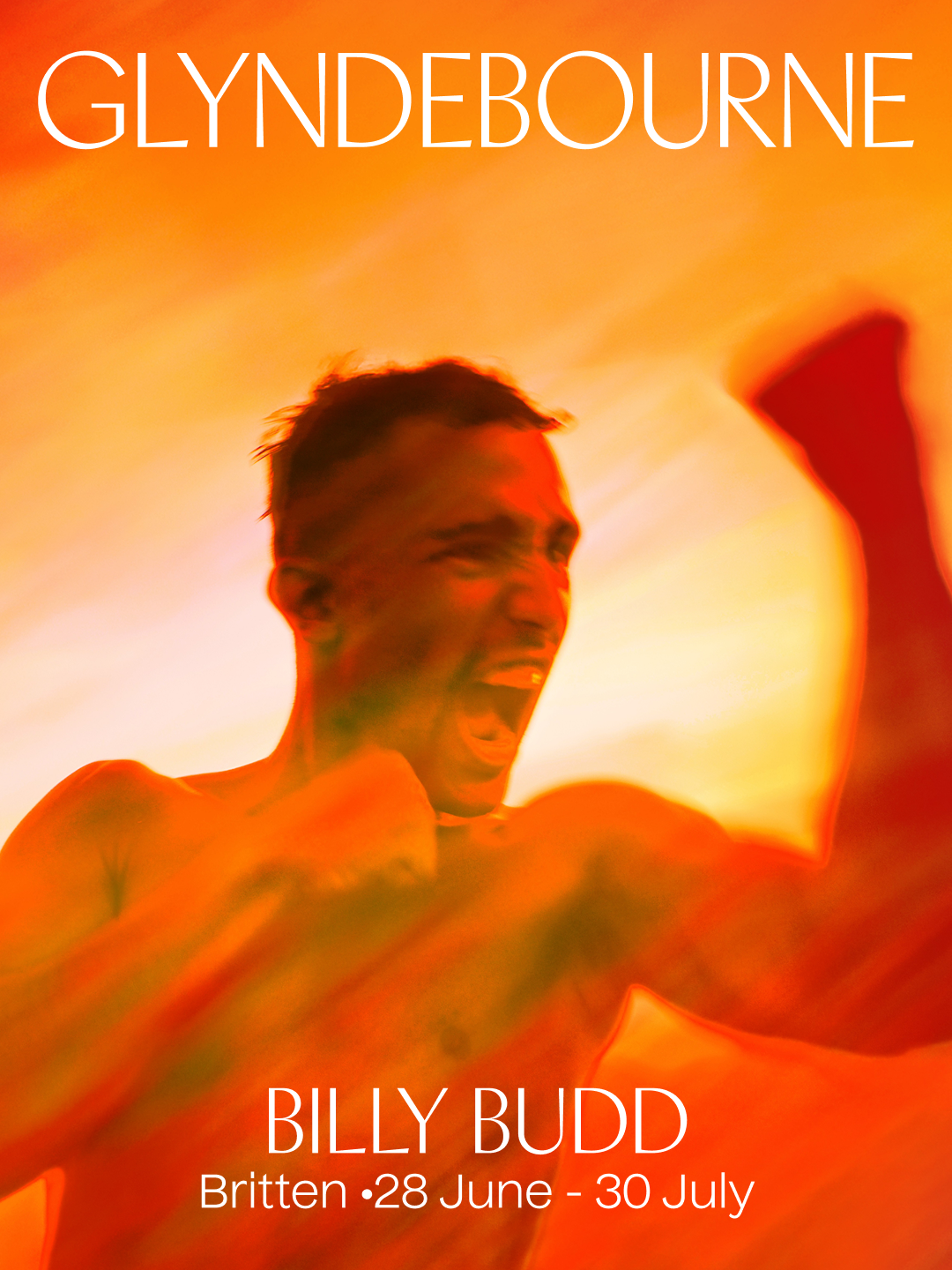 A shirtless man appears to be yelling or shouting in an intense moment, against an orange background. The text indicates it is promoting a Billy Budd production at Glyndebourne, taking place from June 28 to July 30.