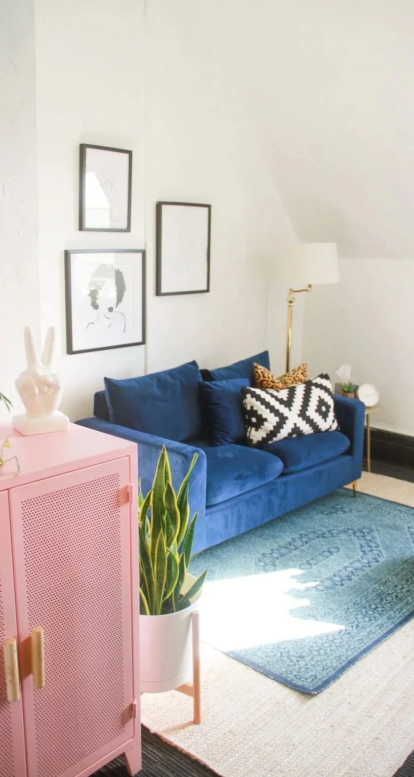 The Healing Center's Nashville therapy office, displaying a cobalt blue couch, blue abstract rug, and other eclectic decor.