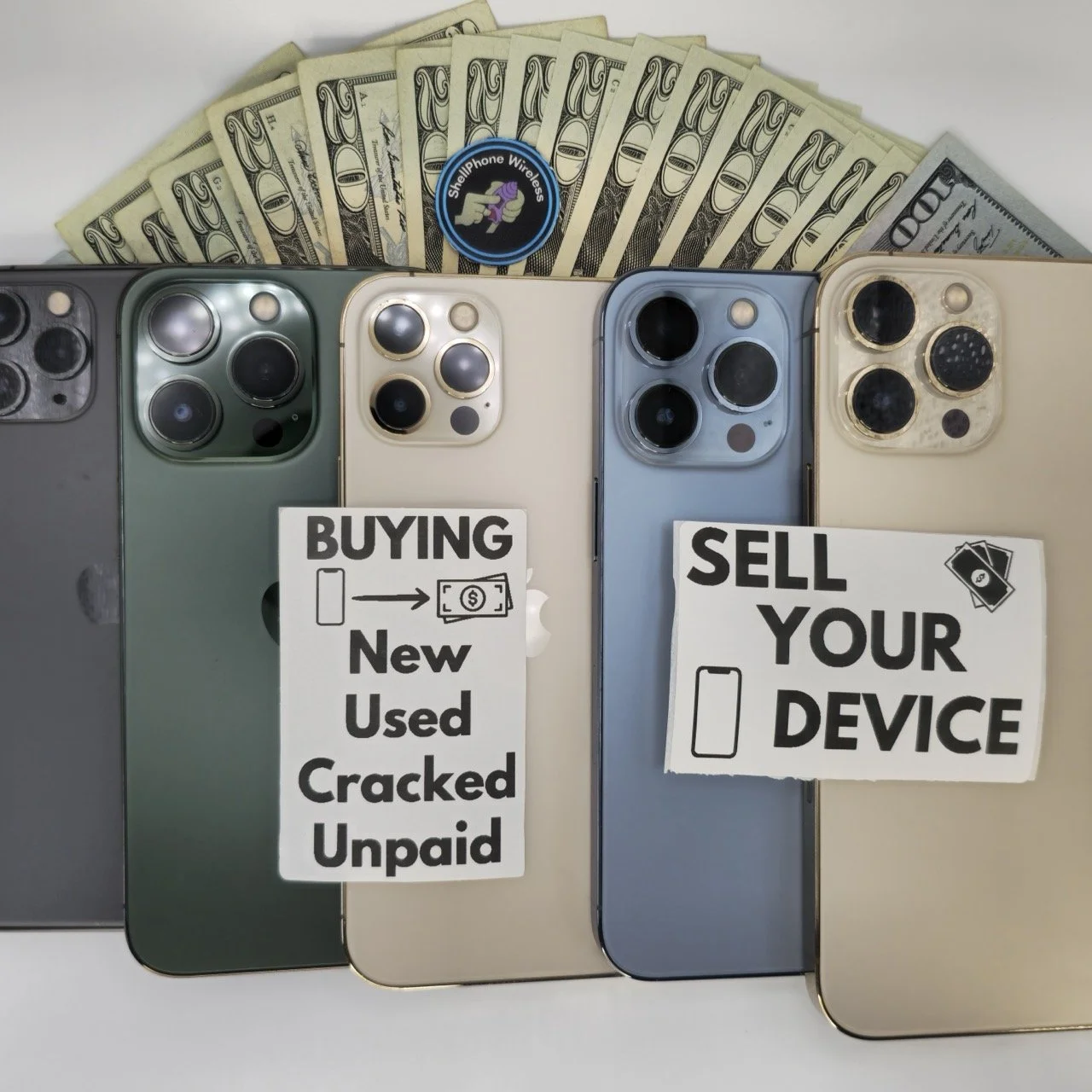 Four smartphones with camera lenses, two signs reading "Buying New Used Cracked Unpaid" and "Sell Your Device," cash, and a Shellphone Wireless sticker.